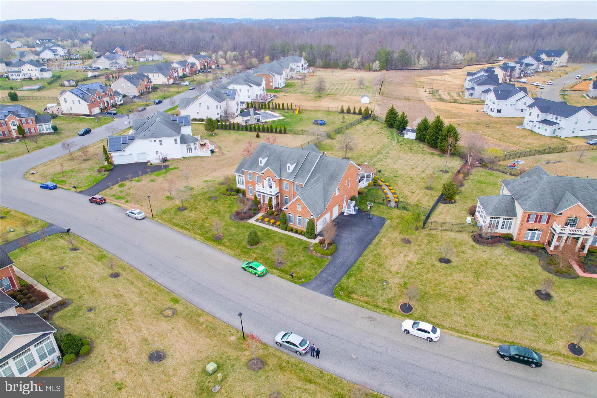 14302 Derby Ridge Road Bowie, MD 20721 - Photo 65 of 67 an aerial view of a house with a swimming pool