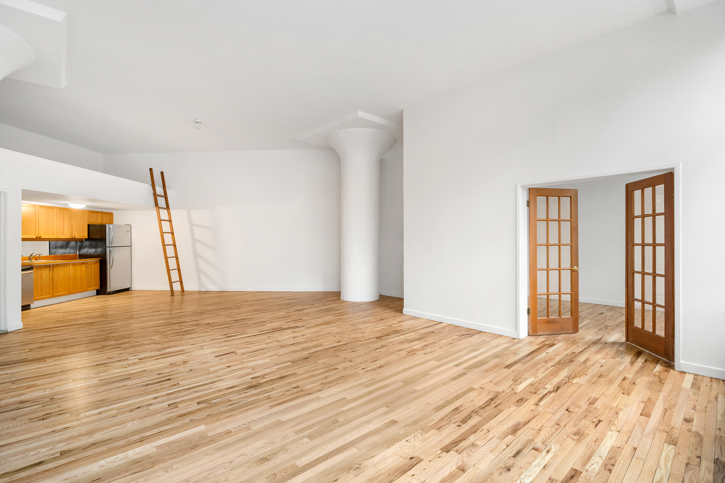 110 Clifton Place, Unit 2B Brooklyn, NY 11238 - Photo 4 of 7 a view of empty room with wooden floor