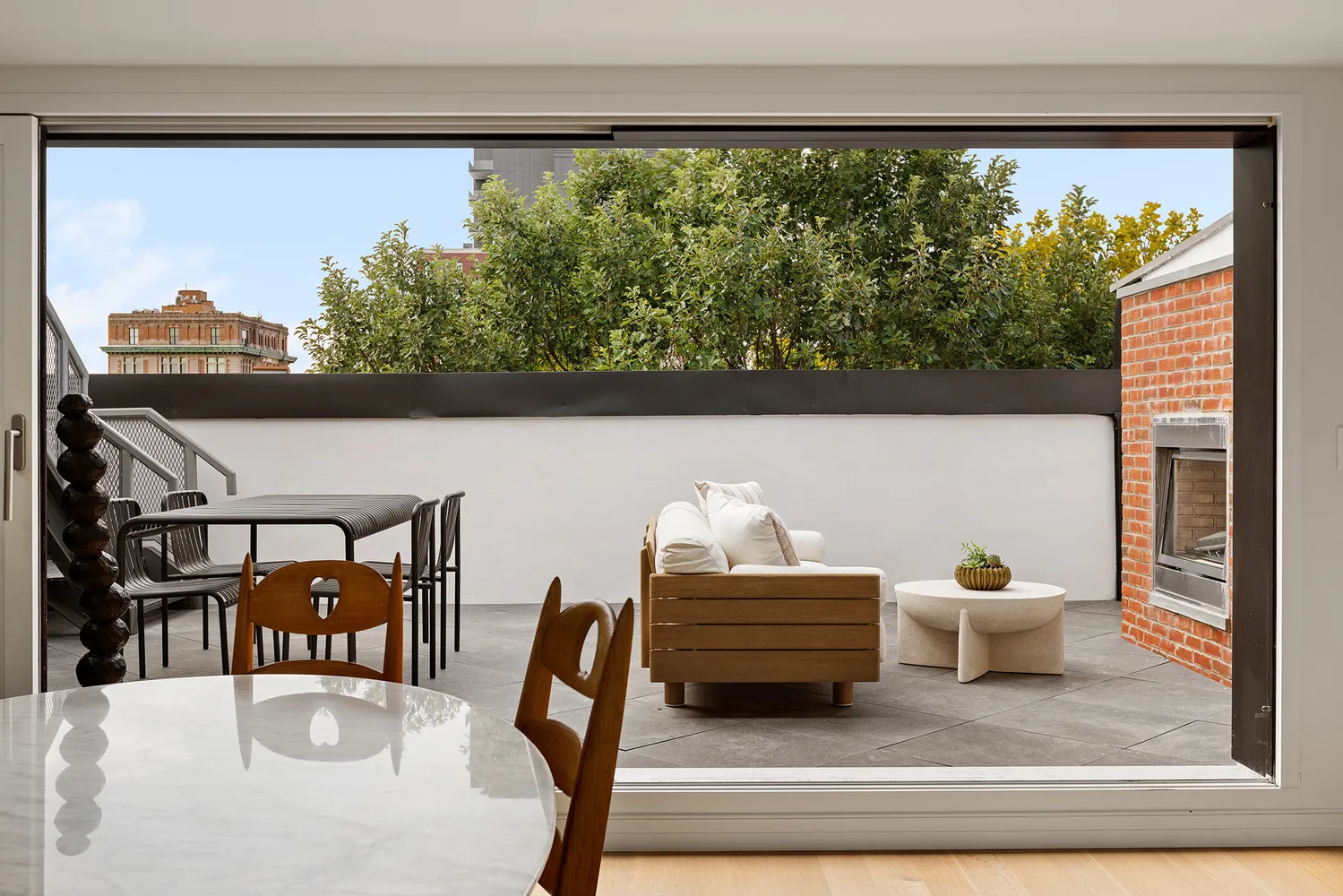 a view of living room with furniture and garden view