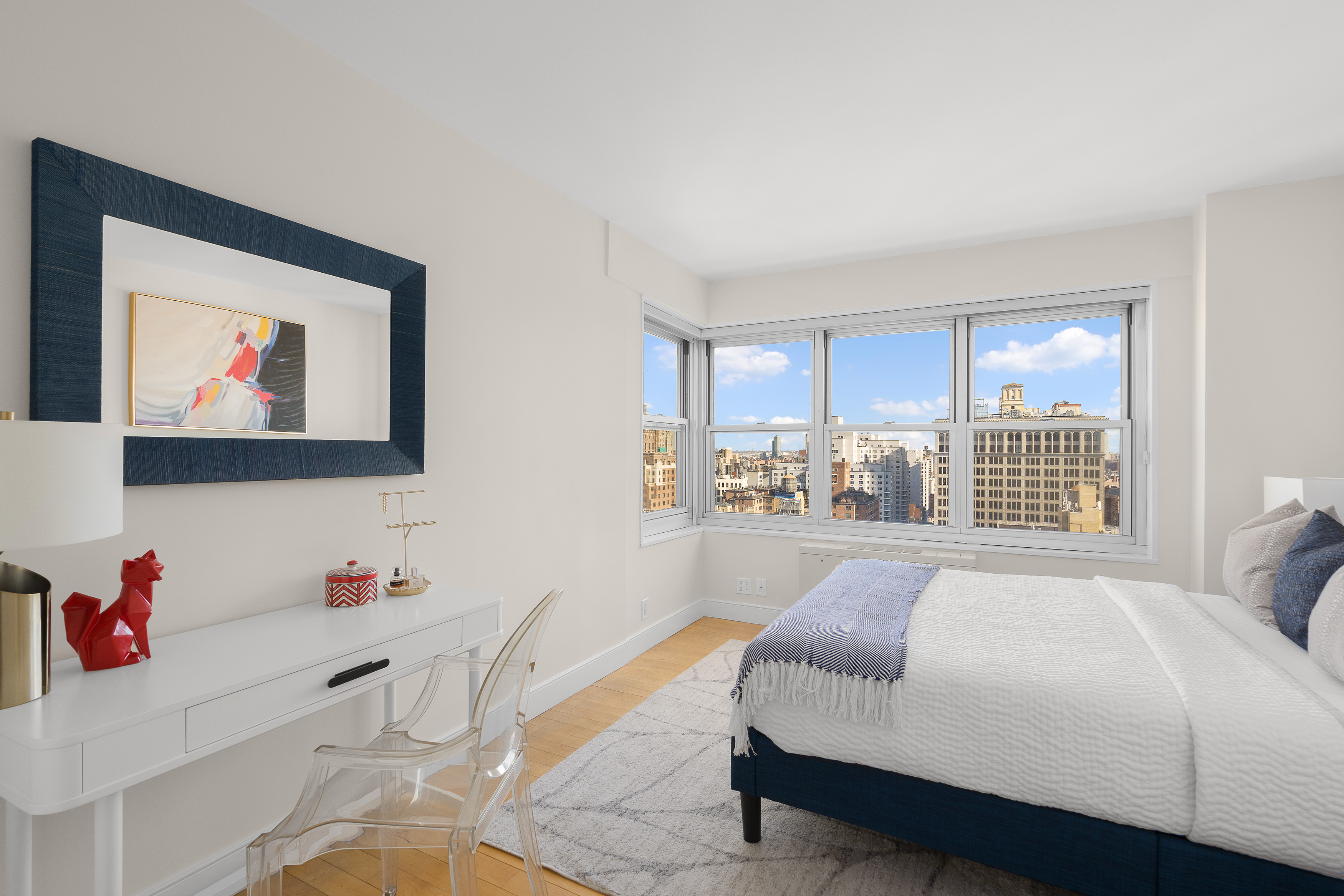 20 East 9th Street, Unit 22C Manhattan, NY 10003 - Photo 8 of 21 a bedroom with a bed and a window