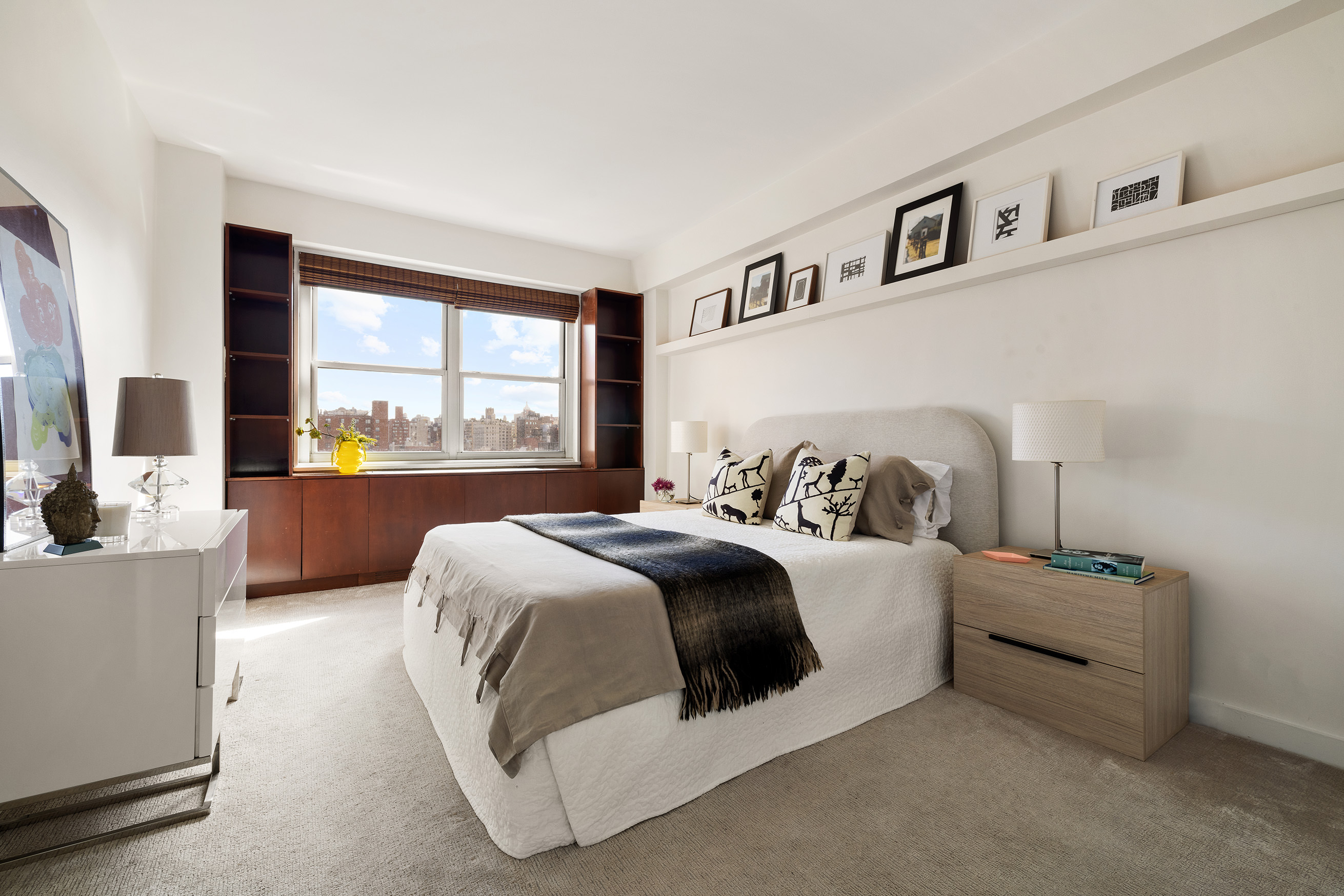 360 West 22nd Street, Unit 12B Manhattan, NY 10011 - Photo 7 of 16 a bedroom with bed and a large window
