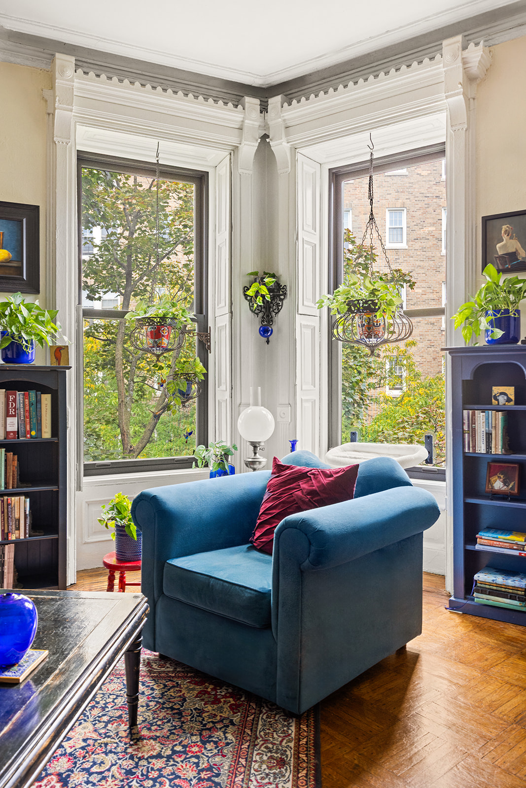 206 Lincoln Place, Unit 7 Brooklyn, NY 11217 - Photo 3 of 9 a living room with furniture and a potted plant
