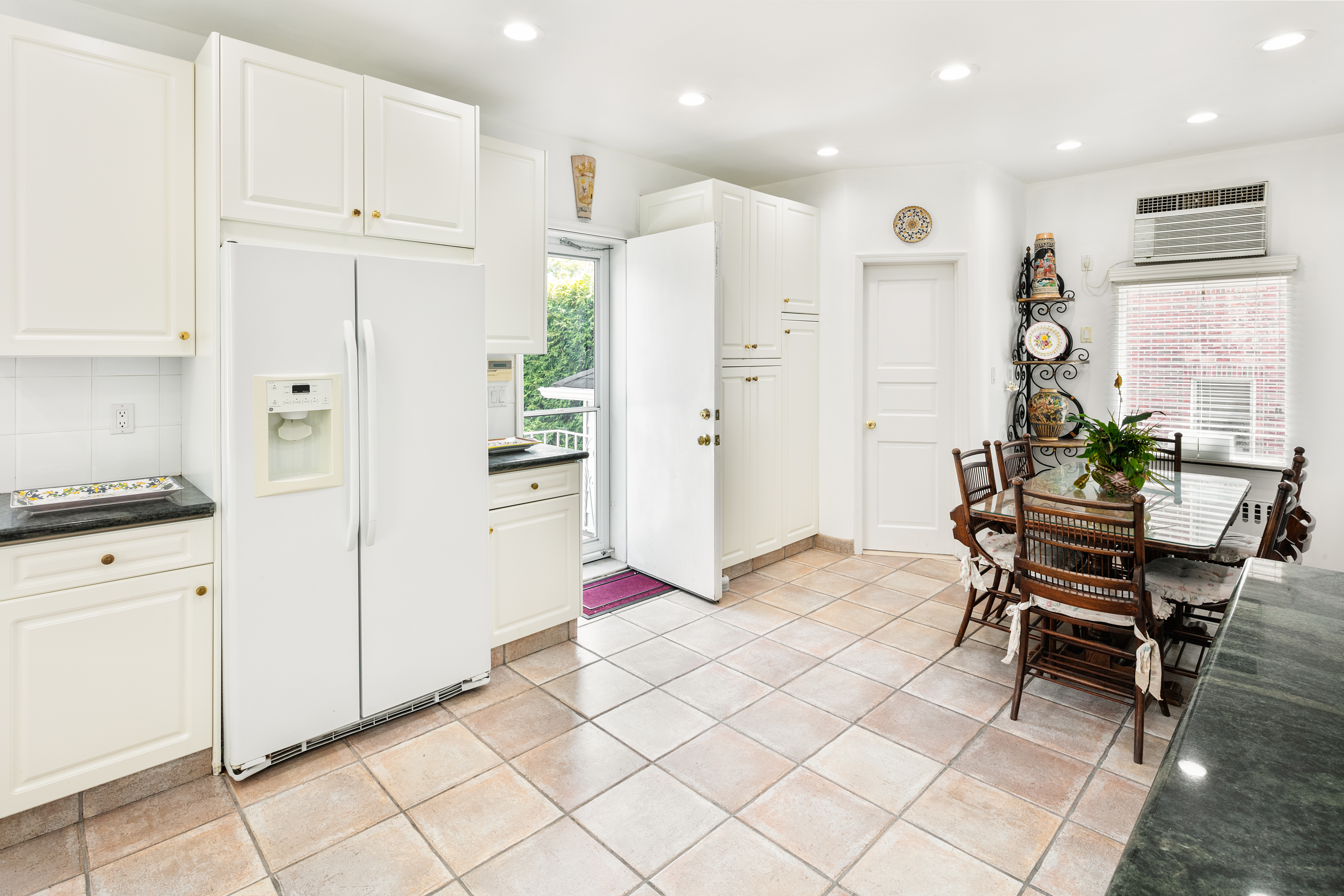 91 81st Street Brooklyn, NY 11209 - Photo 10 of 19 a view of kitchen with furniture and refrigerator
