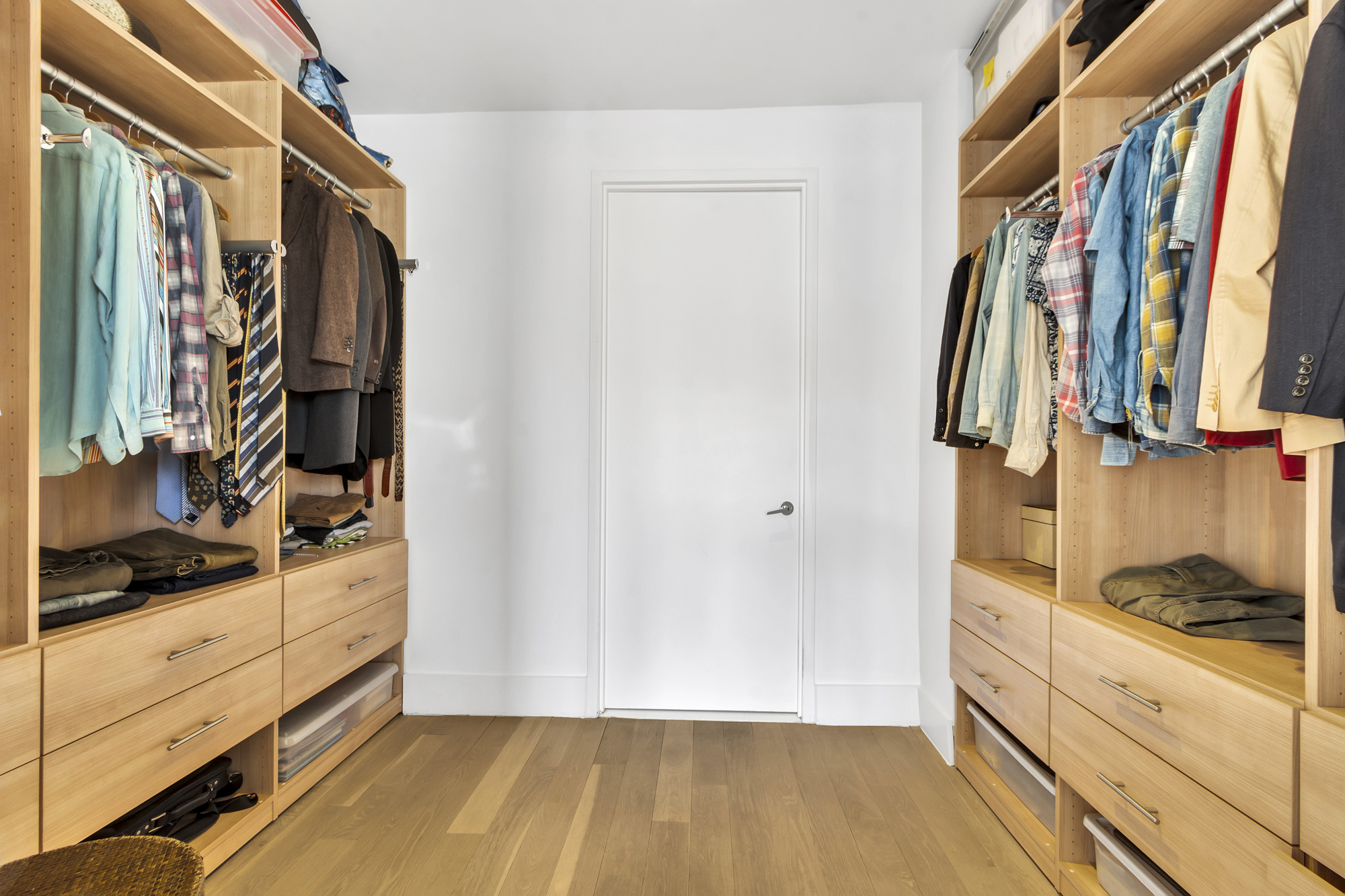 267 West 124th Street, Unit 6A Manhattan, NY 10027 - Photo 16 of 24 a view of walk in closet with clothes and shoes