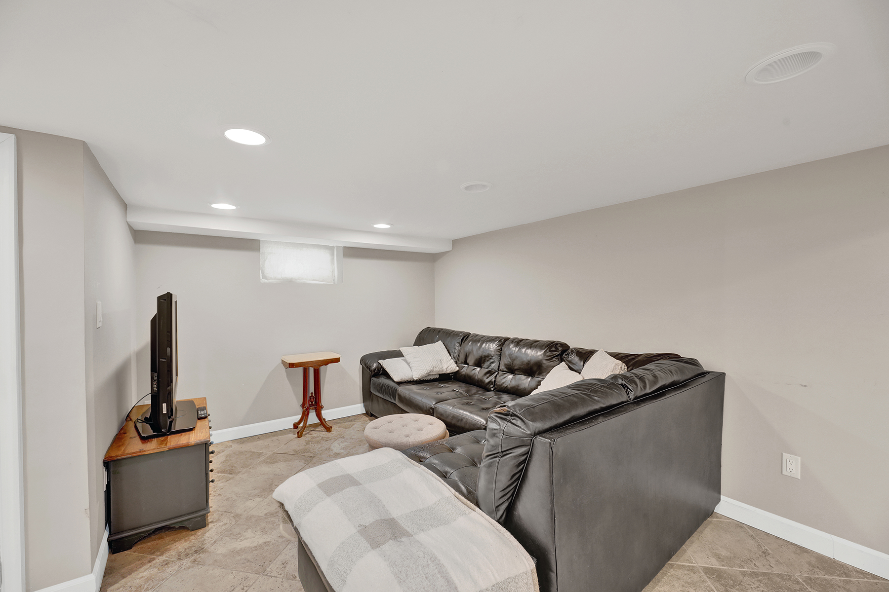 334 Beach 146th Street Queens, NY 11694 - Photo 19 of 21 a living room with furniture and a flat screen tv