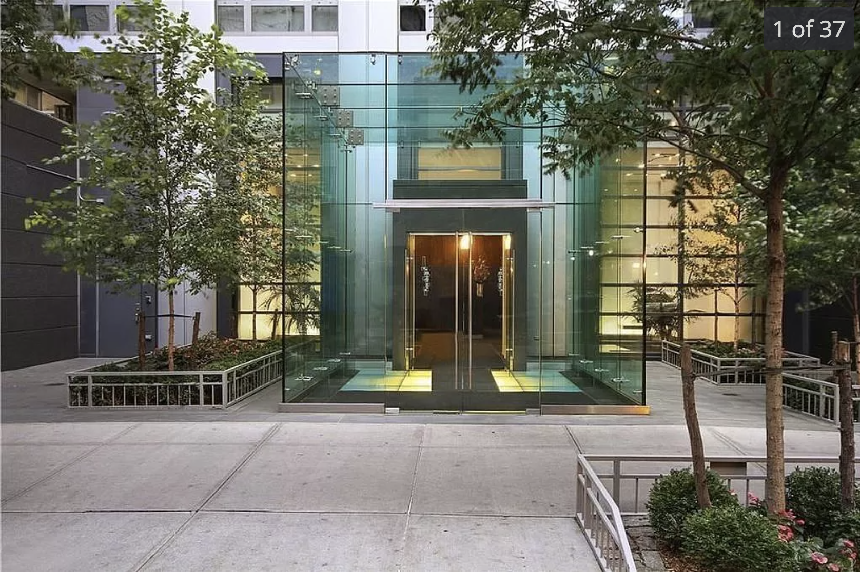 310 West 52nd Street, Unit 5F Manhattan, NY 10019 - Photo 12 of 13 a front view of a building with street view