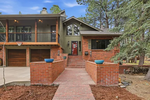 a front view of a house with a porch
