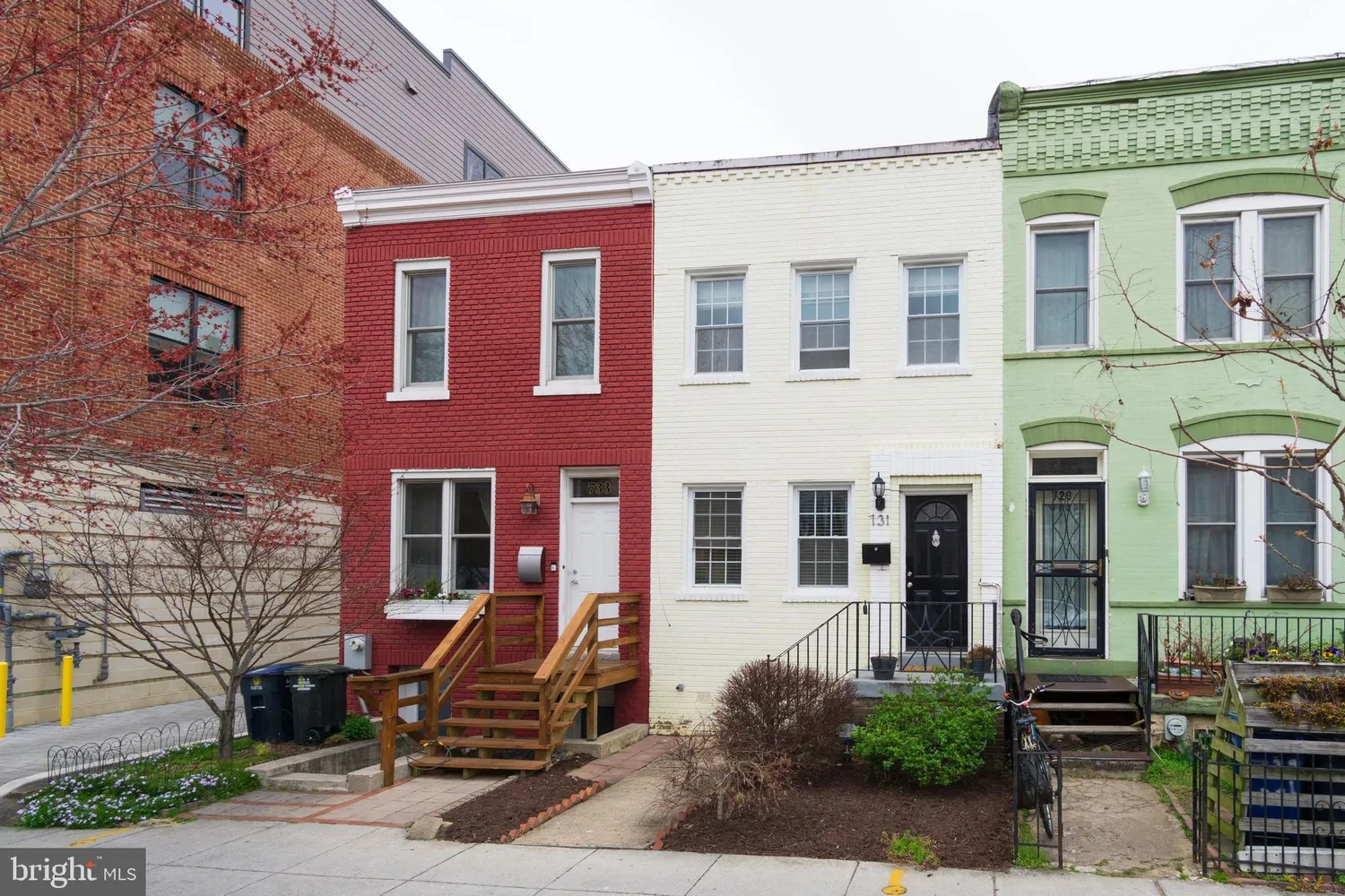 a front view of a building with many windows