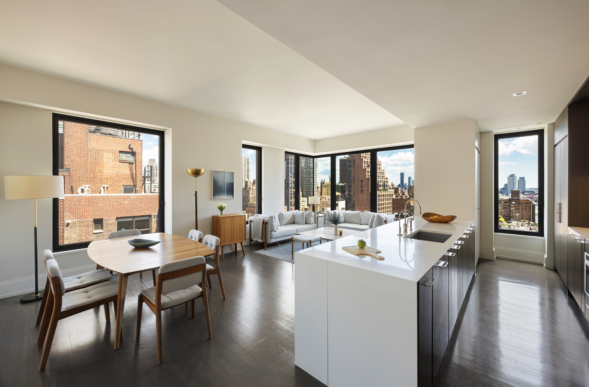 301 East 50th Street, Unit 16B Manhattan, NY 10022 - Photo 3 of 15 a room with a large window and furniture