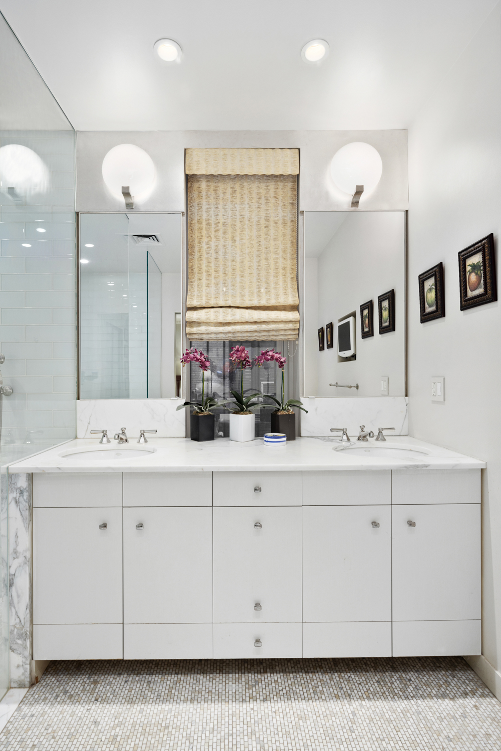 333 Central Park West, Unit 11 Manhattan, NY 10025 - Photo 14 of 21 a bathroom with a sink vanity and mirror