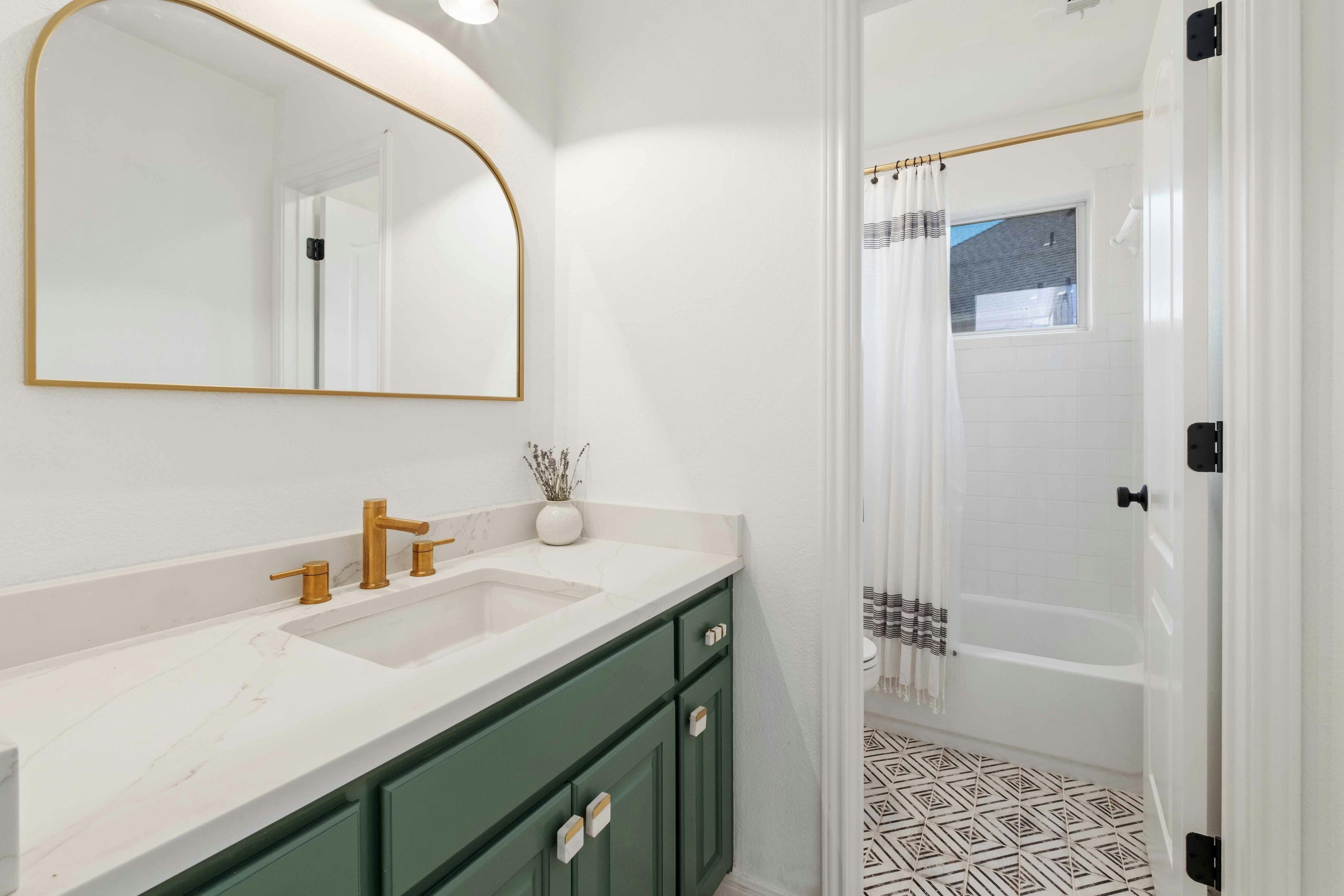 10608 Pointe View Drive Austin, TX 78738 - Photo 27 of 46 a bathroom with a sink and a mirror