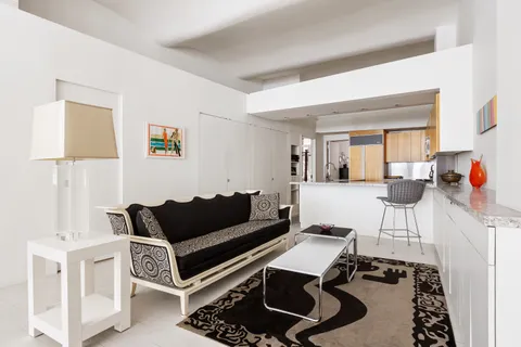 a living room with furniture and a couch