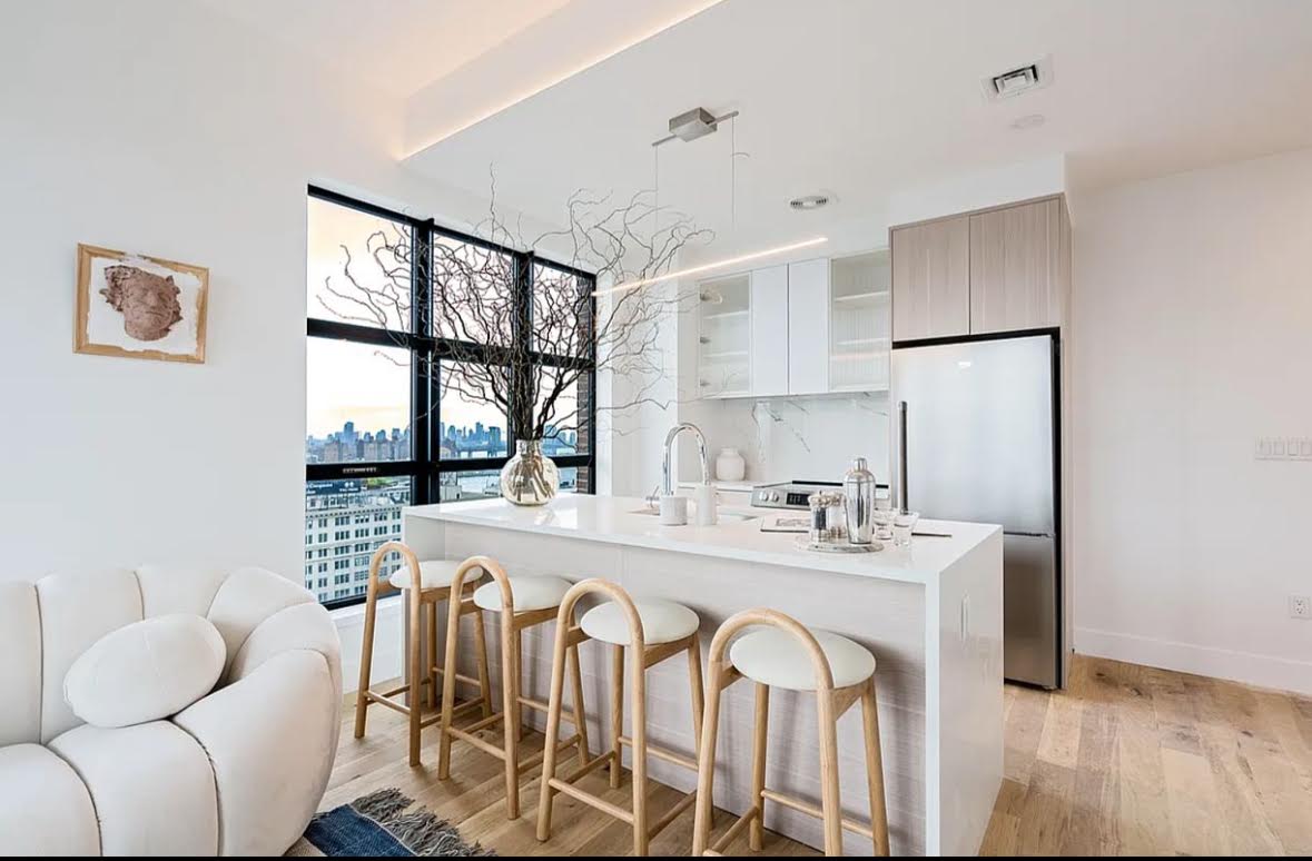 69 Adams Street, Unit 20A Brooklyn, NY 11201 - Photo 2 of 14 a dining room with furniture and a large window