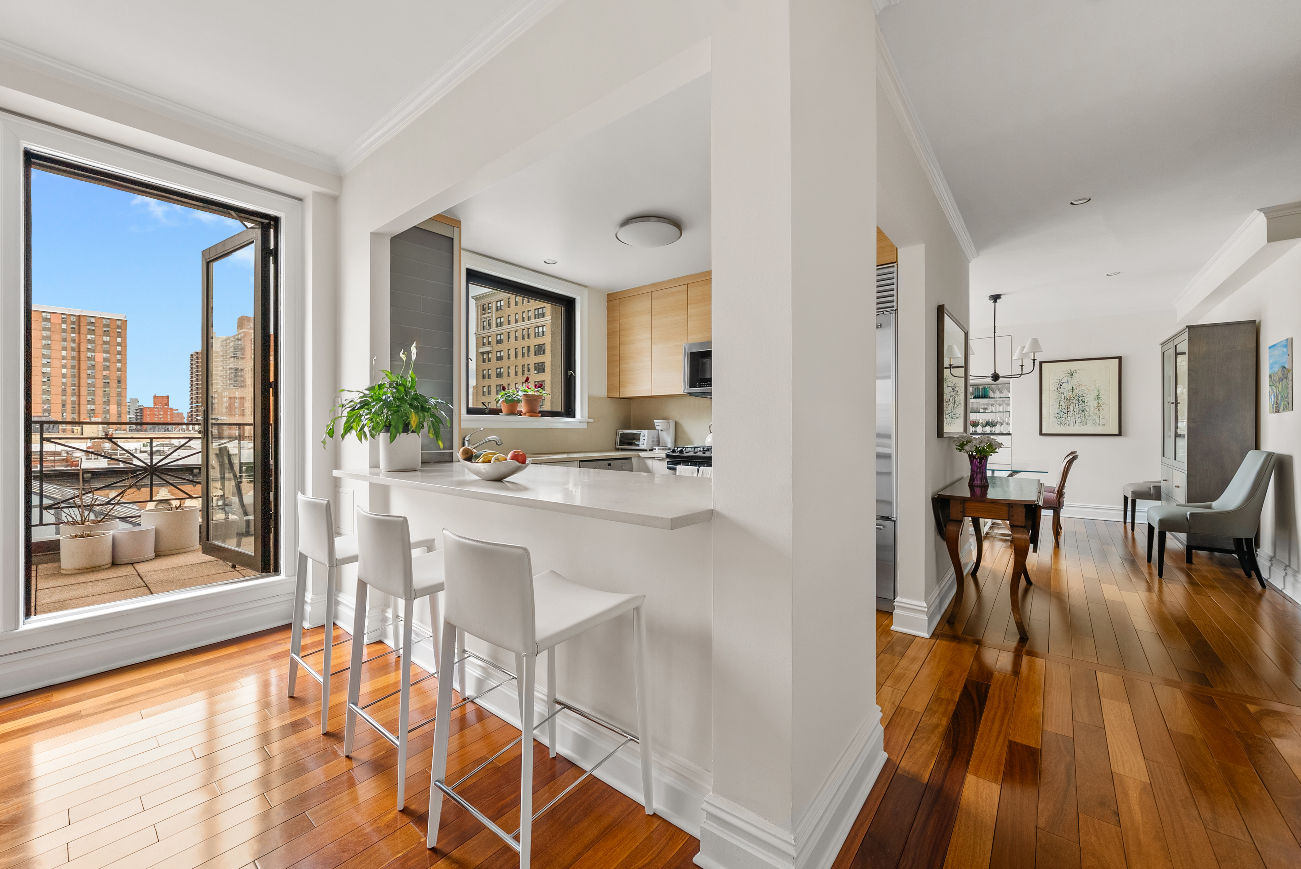 203 West 90th Street, Unit 7H Manhattan, NY 10024 - Photo 7 of 18 a living room with furniture and a table
