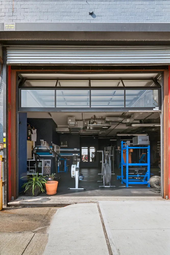 an outdoor view of shop with a outdoor seating