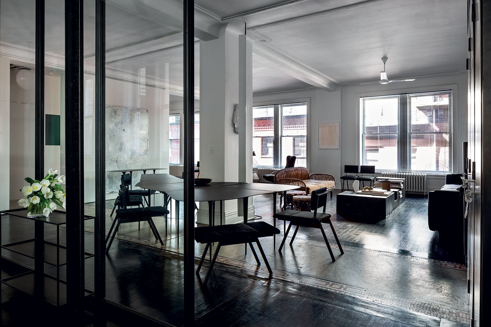 366 Broadway, Unit 5C Manhattan, NY 10013 - Photo 4 of 18 a view of a dining room with furniture window and wooden floor