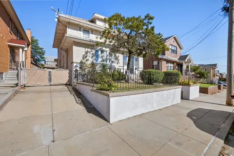 a view of a building with a garden