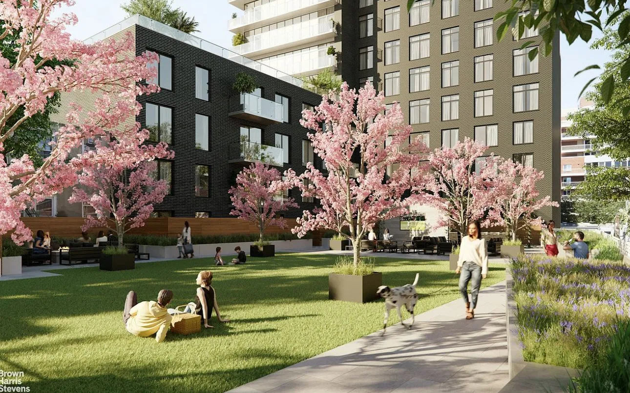 a front view of a building with garden