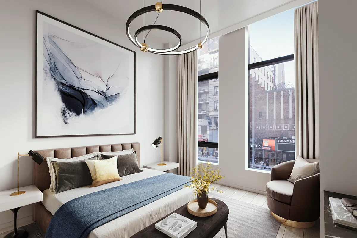 121 East 22nd Street, Unit N205 Manhattan, NY 10010 - Photo 2 of 17 a living room with furniture and a large window