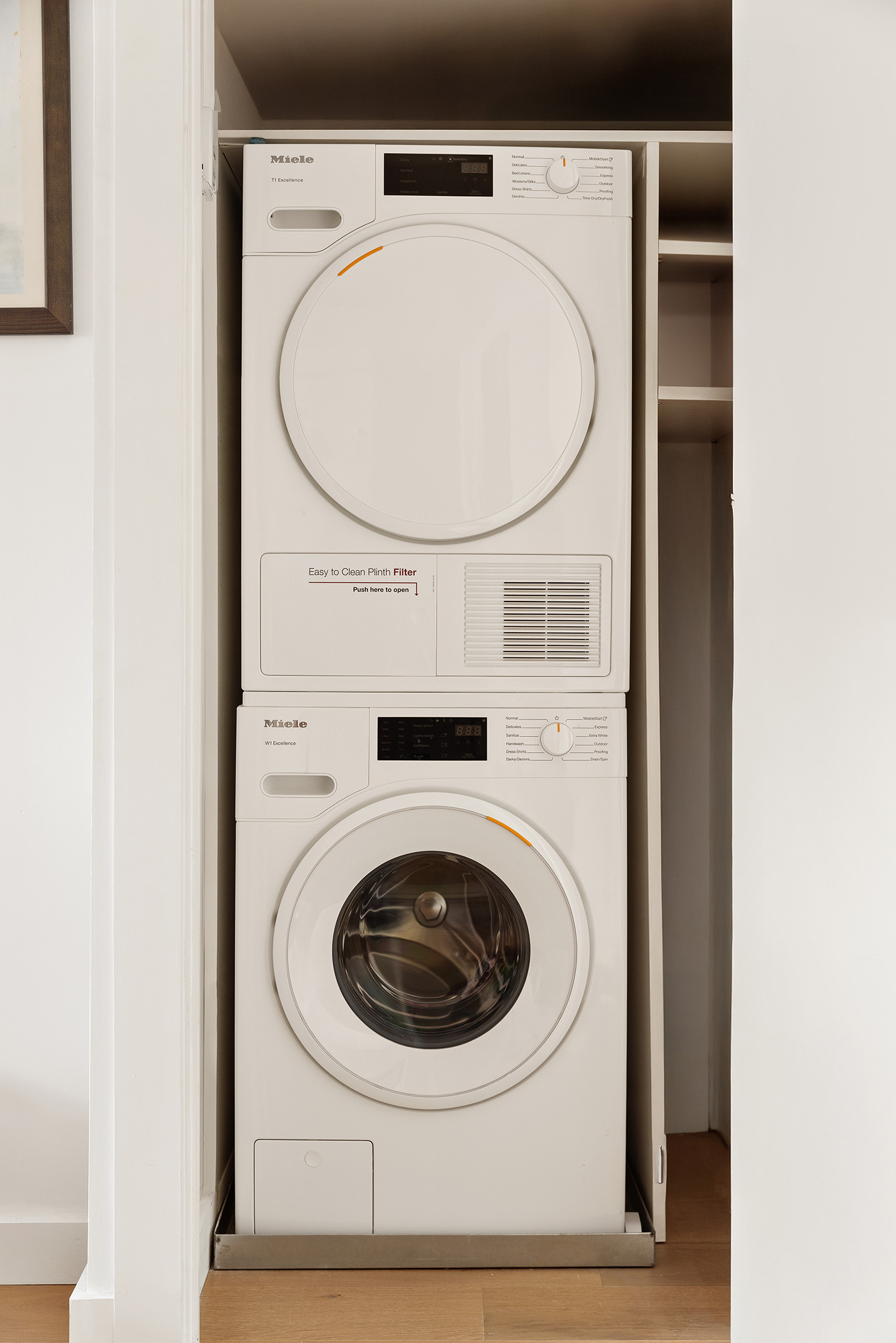 444 East 86th Street, Unit 15G Manhattan, NY 10028 - Photo 9 of 12 a utility room with dryer and washer
