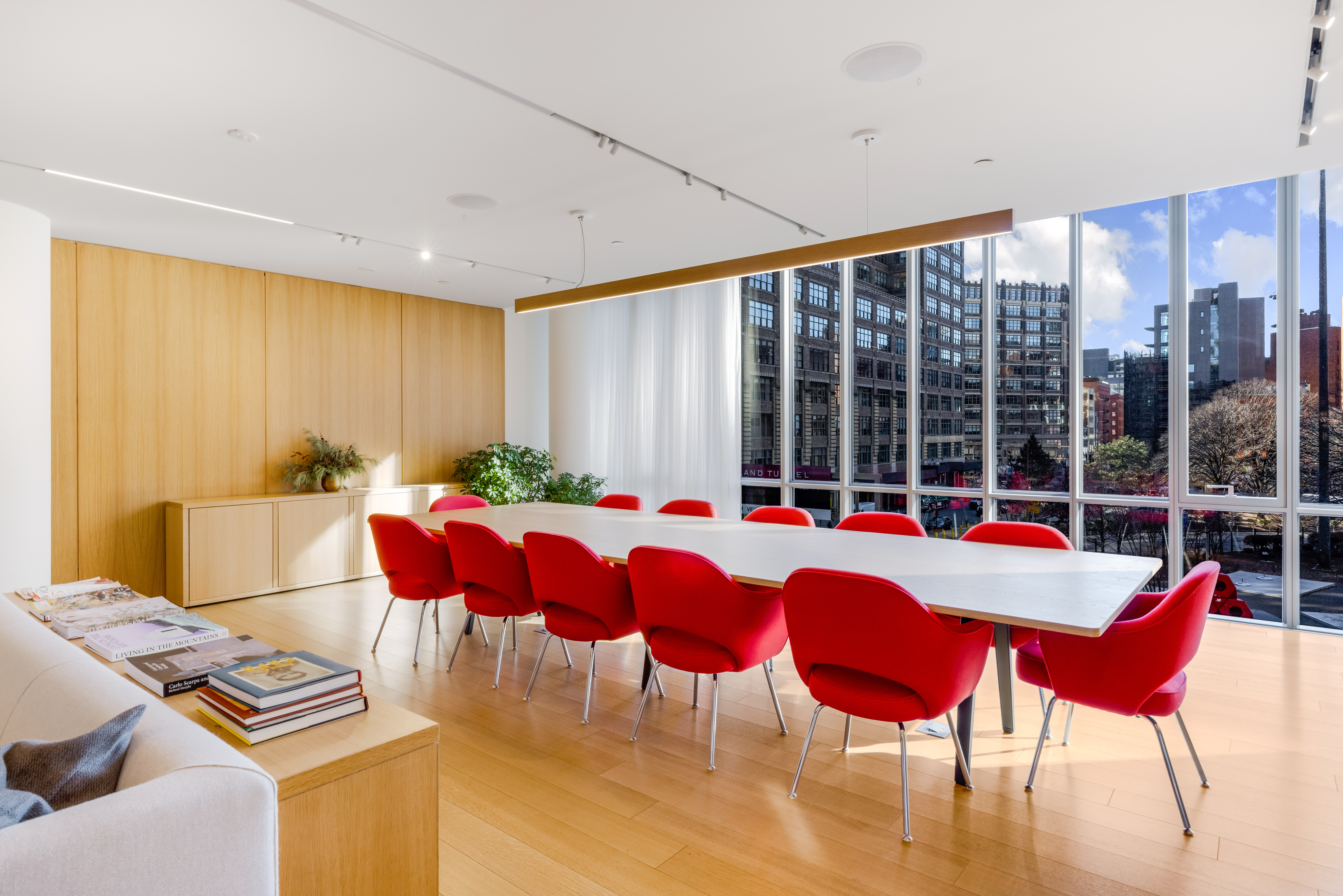 565 Broome Street, Unit S7B Manhattan, NY 10013 - Photo 11 of 13 a view of a dining room with furniture window and outside view