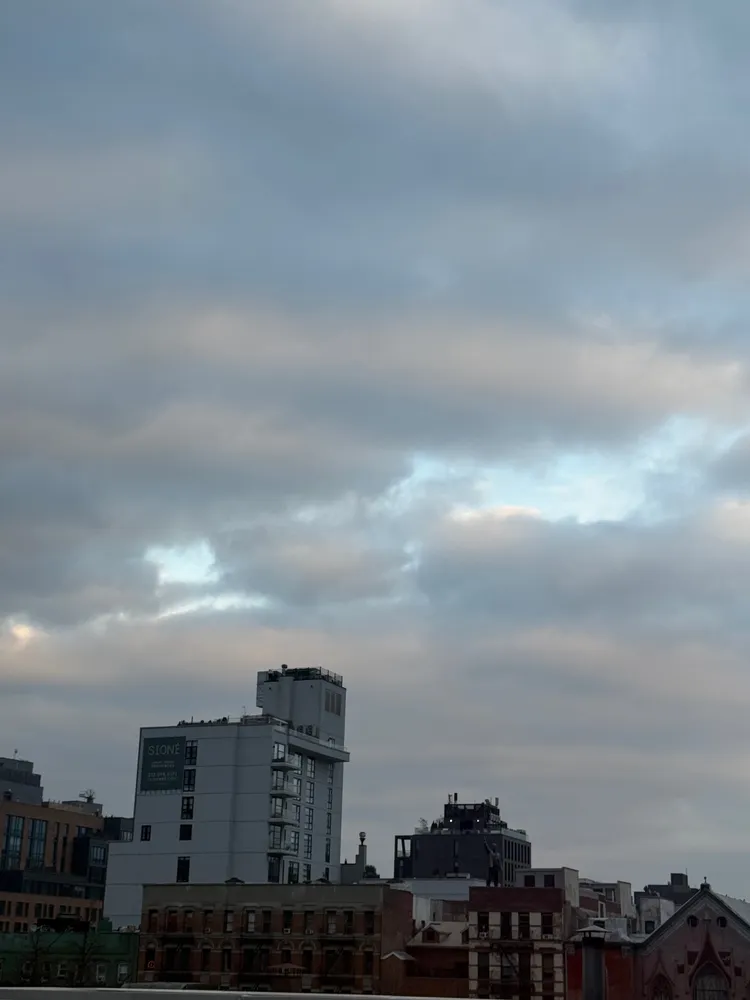 a view of buildings with sky