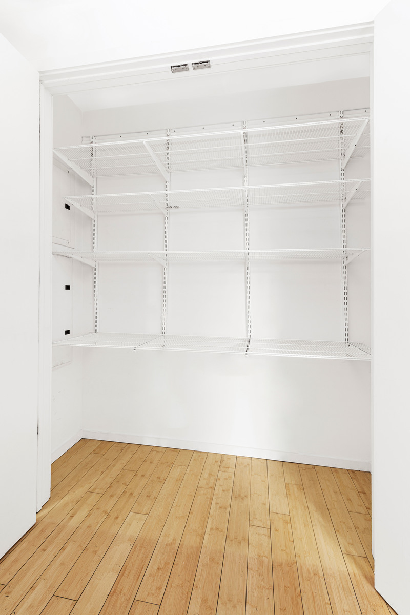 105 Norfolk Street, Unit 2A Manhattan, NY 10002 - Photo 10 of 16 a view of a room with shelf on the wall