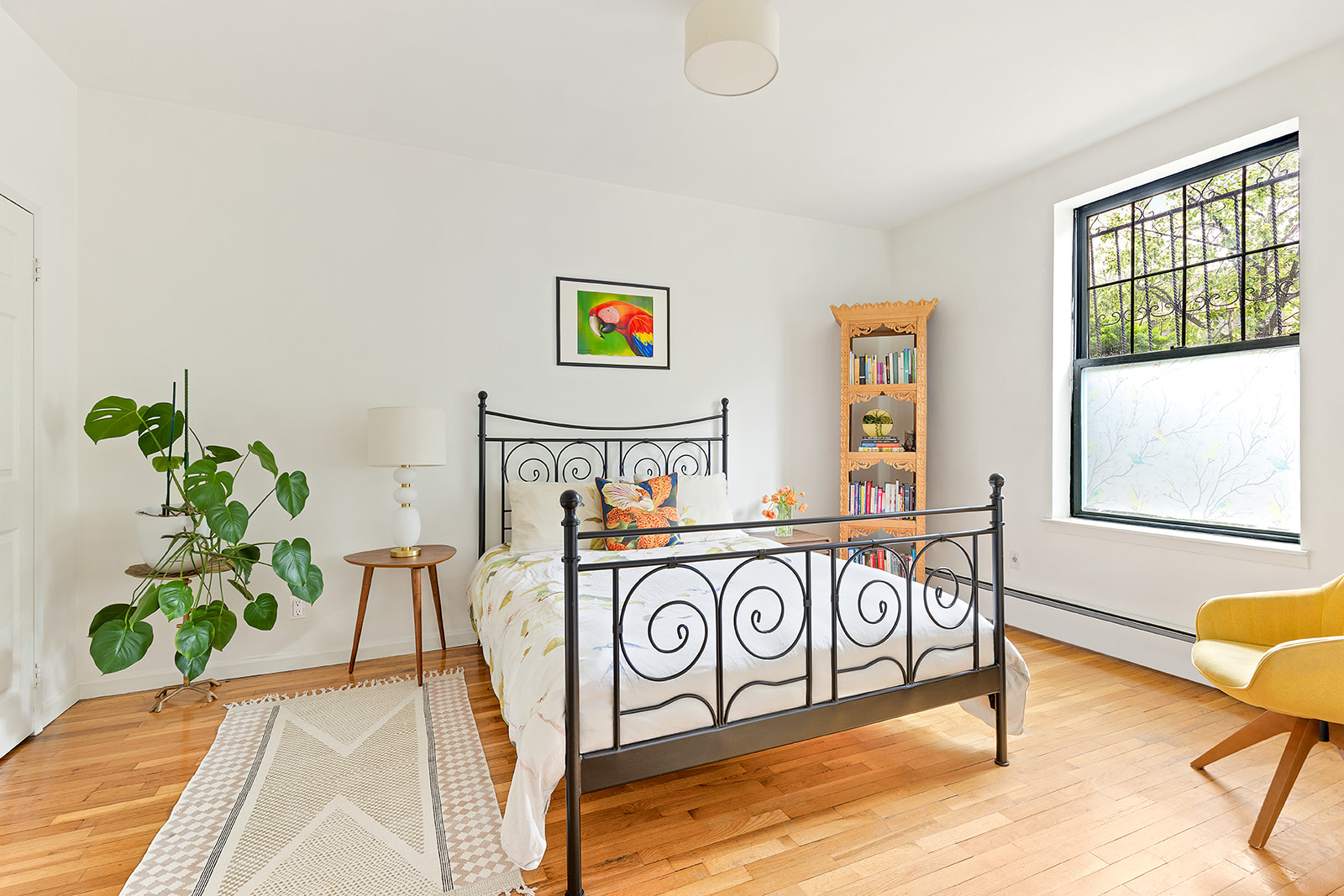 295 St Johns Place, Unit 1A Brooklyn, NY 11238 - Photo 4 of 13 a view of a room with furniture and a potted plant