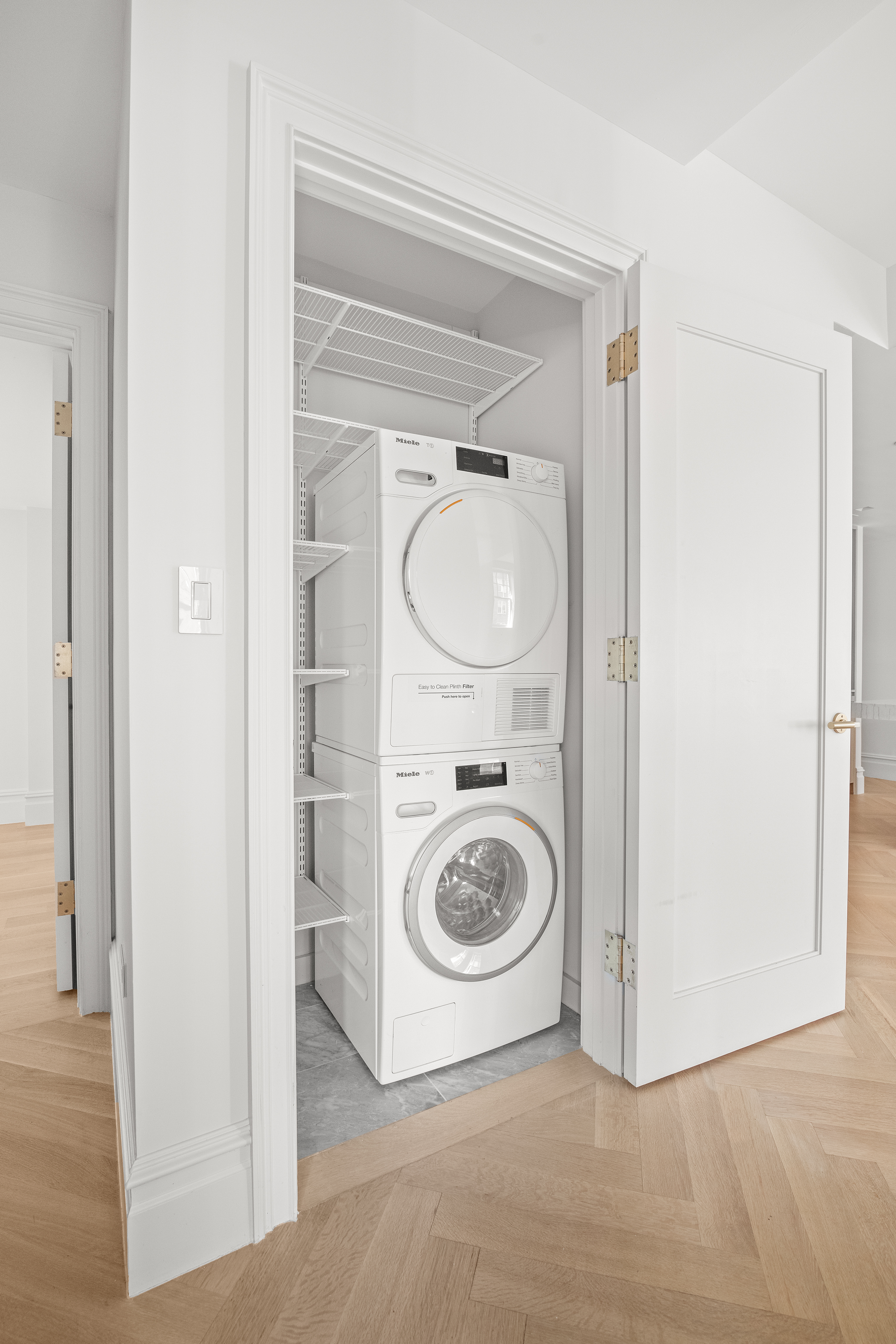 150 West 82nd Street, Unit 7A Manhattan, NY 10024 - Photo 11 of 15 a utility room with washing machine and a sink