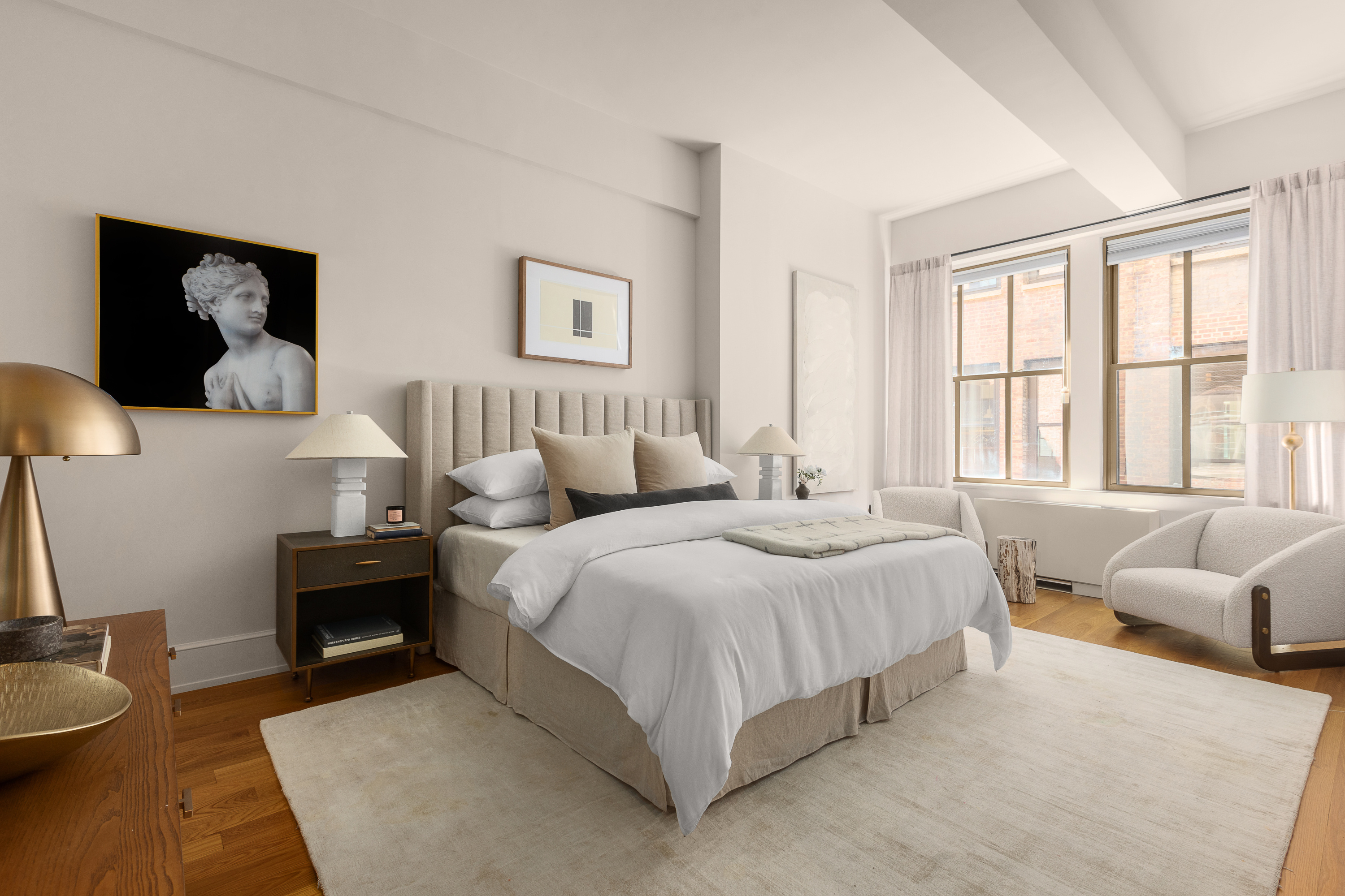 130 West 30th Street, Unit 4C Manhattan, NY 10001 - Photo 6 of 15 a spacious bedroom with a bed and glass window