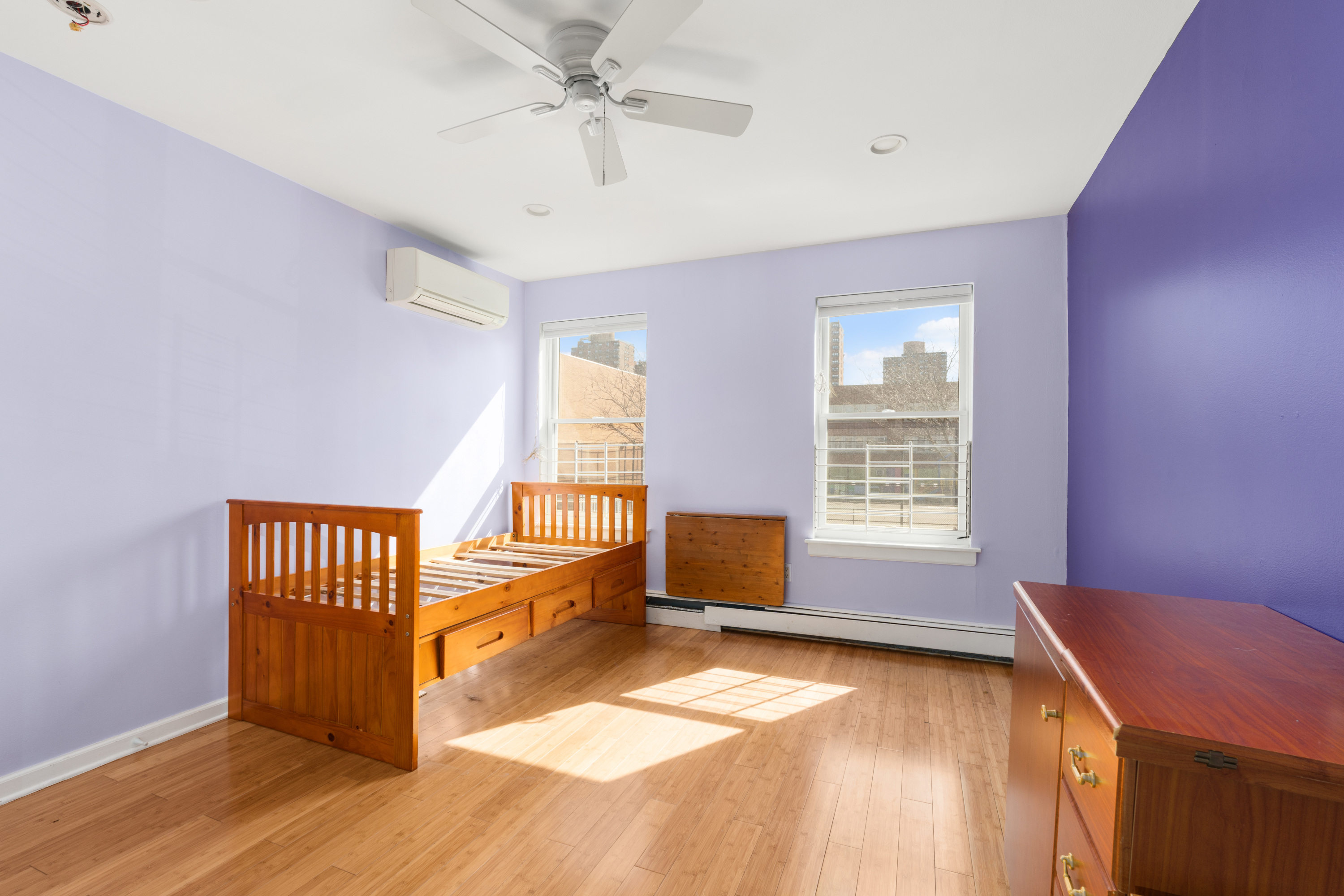 231 East 110th Street Manhattan, NY 10029 - Photo 5 of 11 a view of an empty room with a window