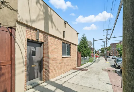 a backyard of a house with seating space