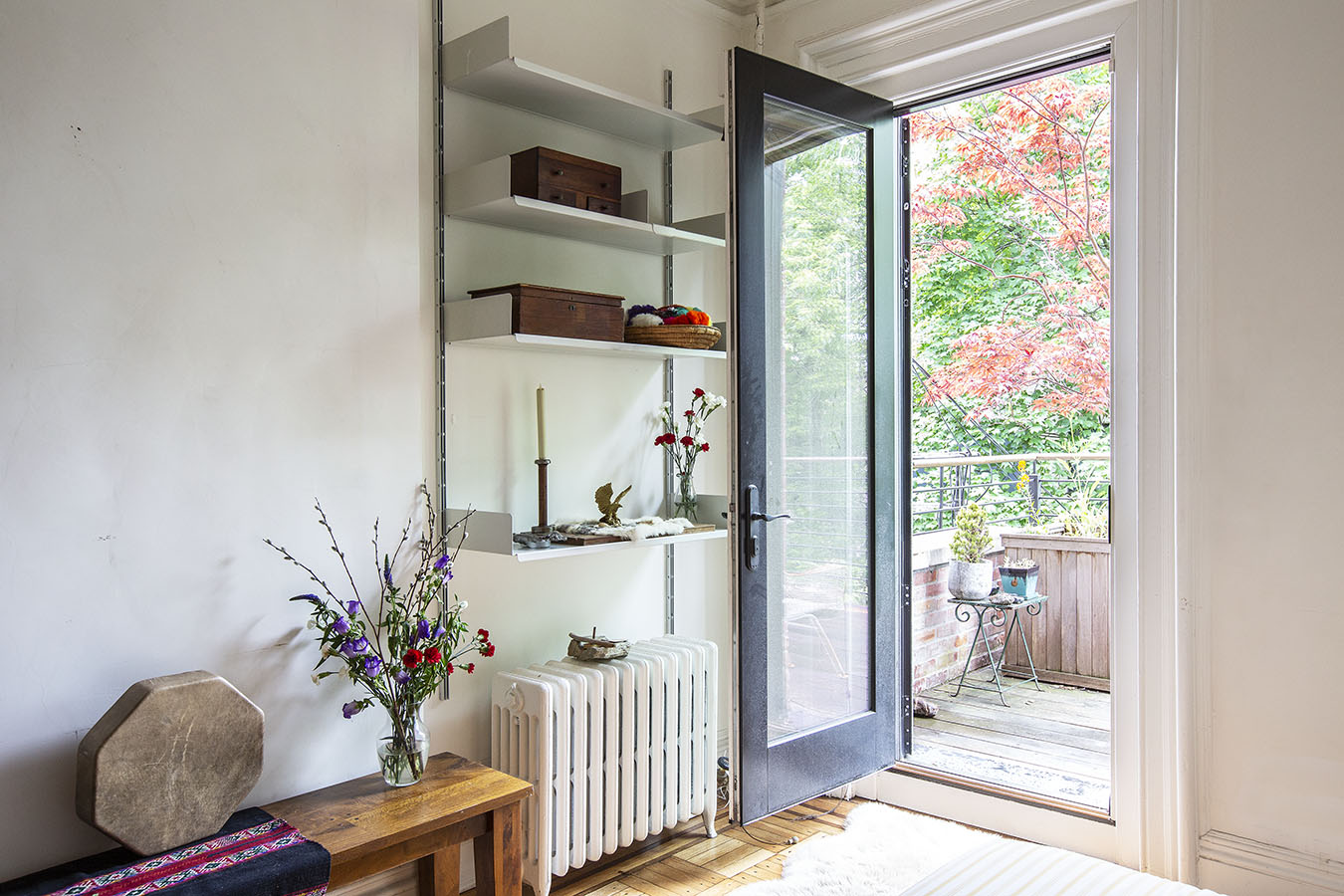 124 Park Place, Unit TRIPLEX Brooklyn, NY 11217 - Photo 9 of 15 a living room with furniture and a window