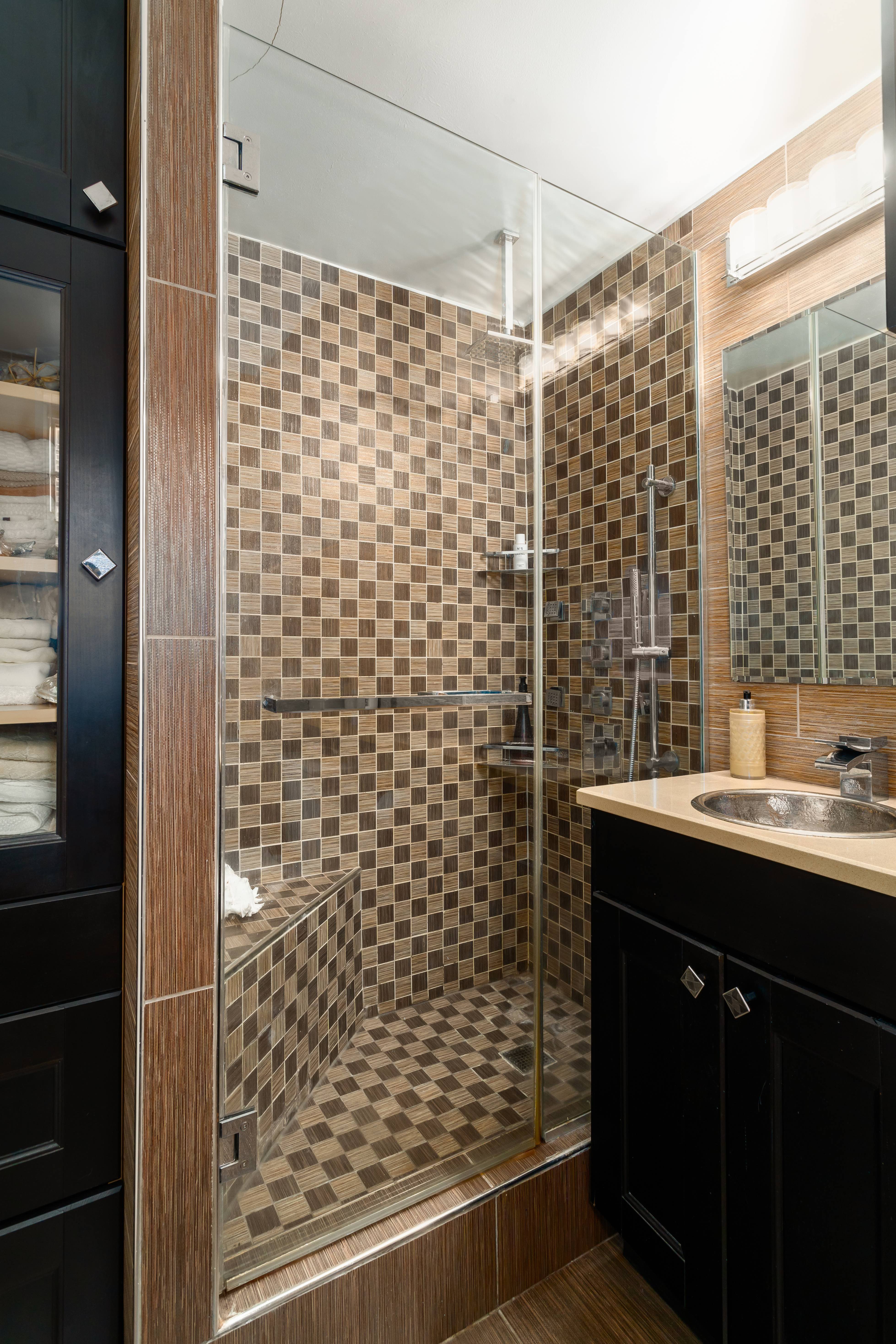 140 Cabrini Boulevard, Unit PH138 Manhattan, NY 10033 - Photo 13 of 30 a bathroom with a shower toilet and a sink