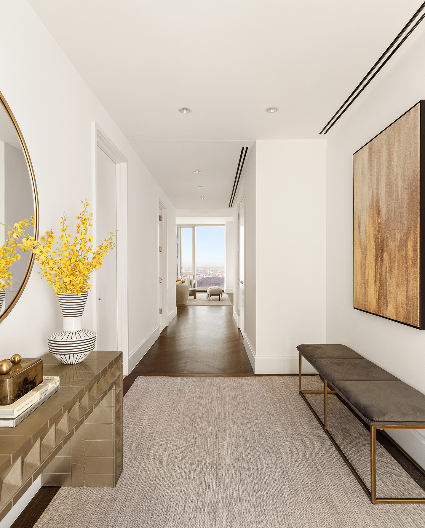 217 West 57th Street, Unit 60W Manhattan, NY 10019 - Photo 13 of 27 a living room with furniture and a table