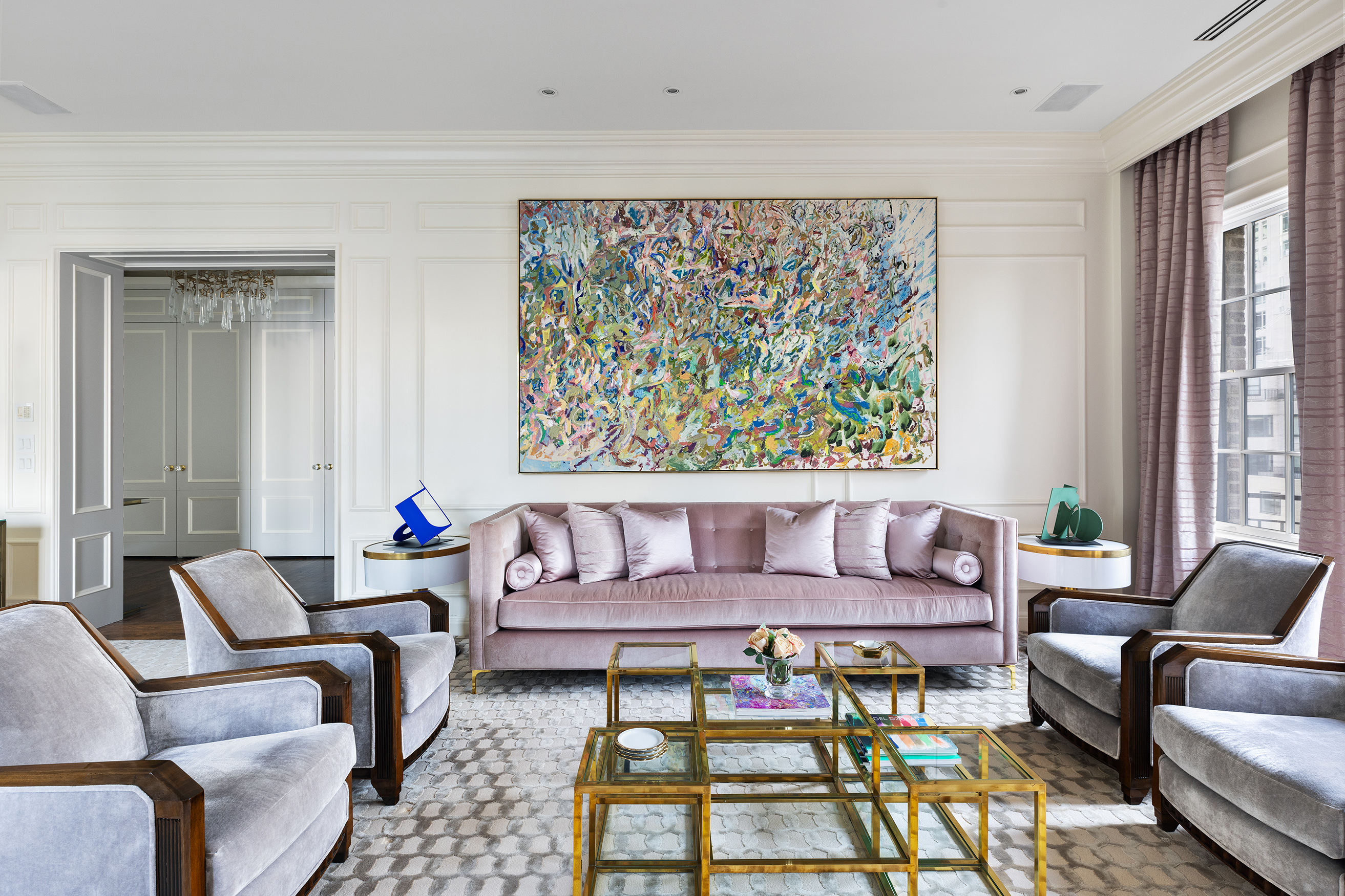 535 Park Avenue, Unit 14C Manhattan, NY 10065 - Photo 4 of 18 a living room with furniture and a large window