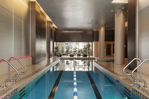 a view of a kitchen with a large window