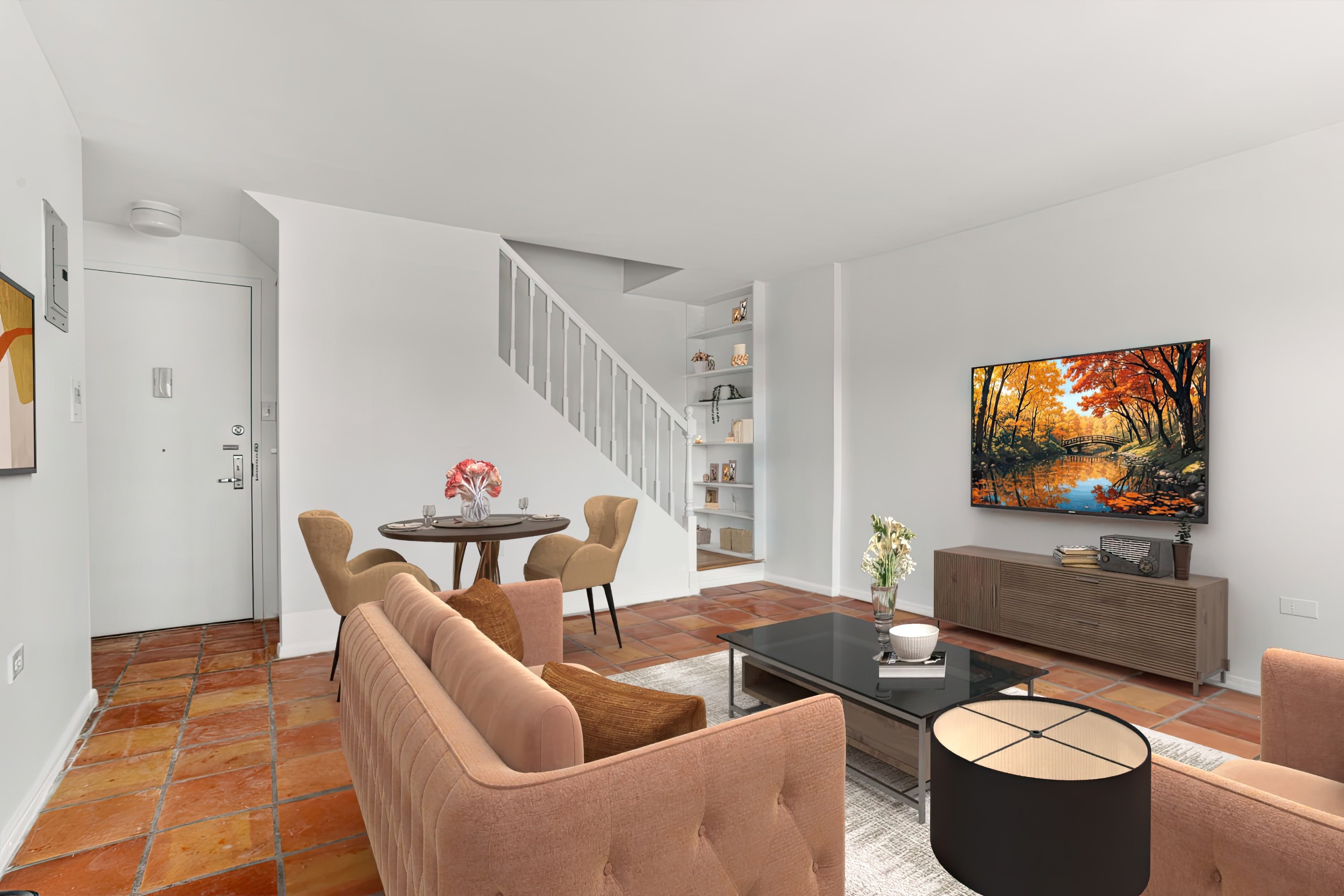 609 Columbus Avenue, Unit 14E Manhattan, NY 10024 - Photo 10 of 24 a living room with furniture and a flat screen tv