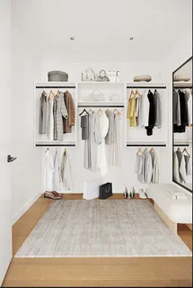 a bathroom with a sink a mirror and a shower