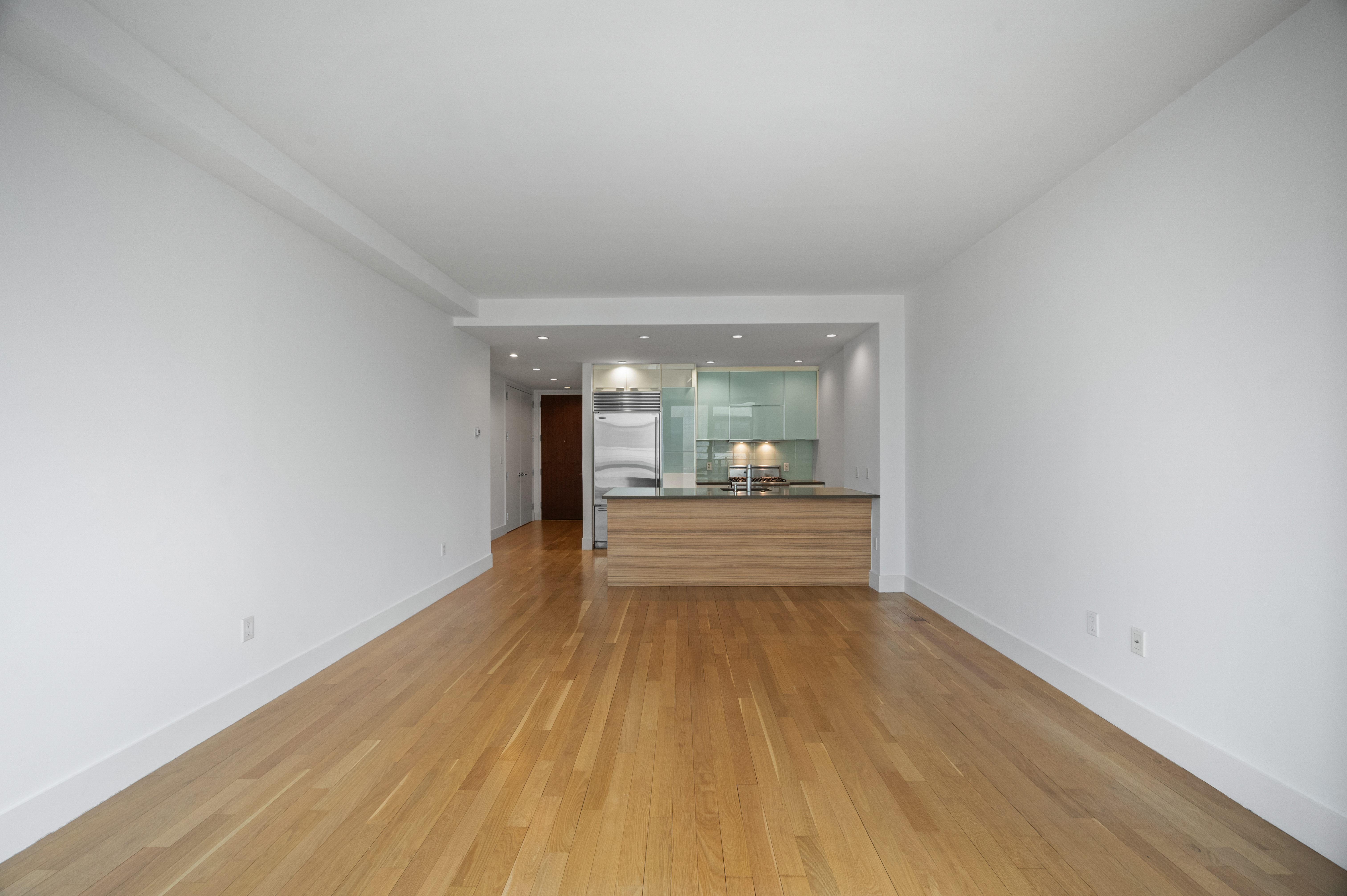 117 West 123rd Street, Unit 5D Manhattan, NY 10027 - Photo 4 of 18 a view of an empty room and window