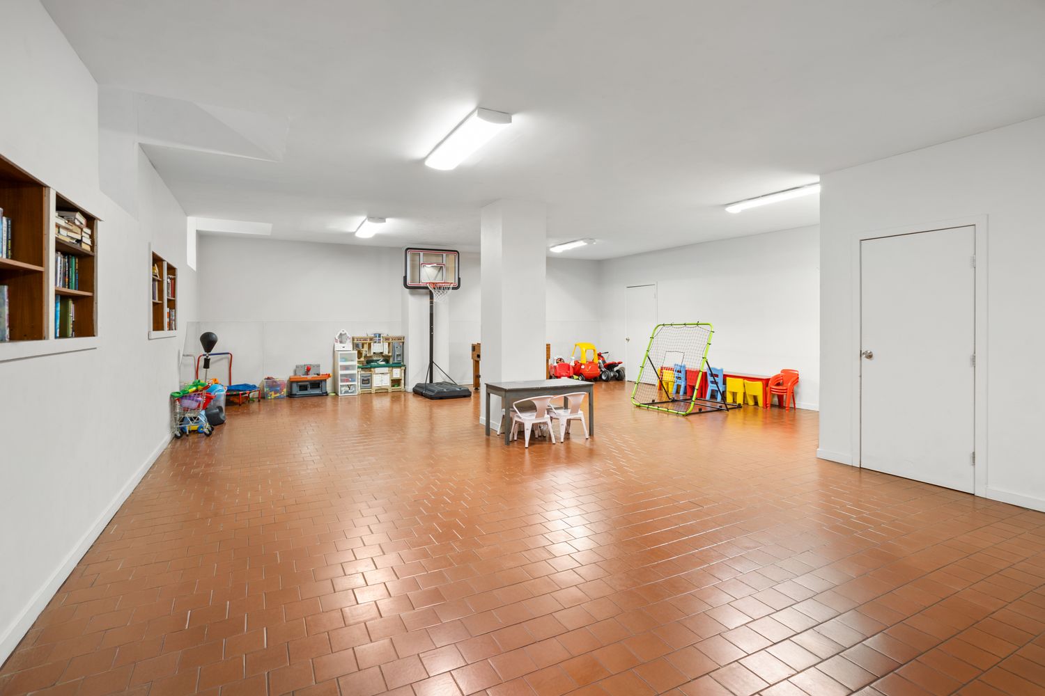 161 East 90th Street, Unit 5C Manhattan, NY 10128 - Photo 13 of 14 a living room with furniture and a wooden floor