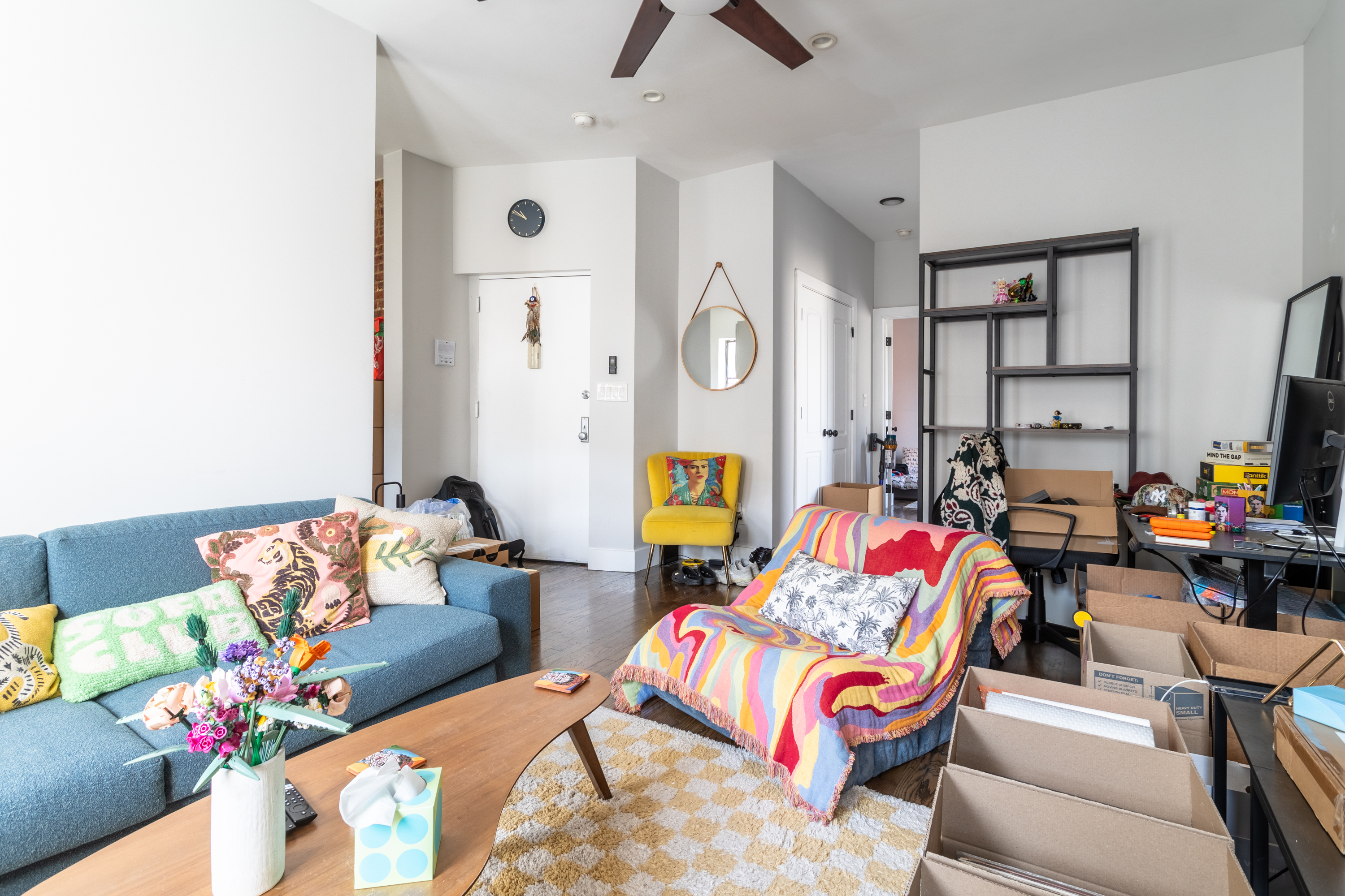 944 Marcy Avenue, Unit 3D Brooklyn, NY 11216 - Photo 5 of 9 a living room filled with furniture and a flat screen tv