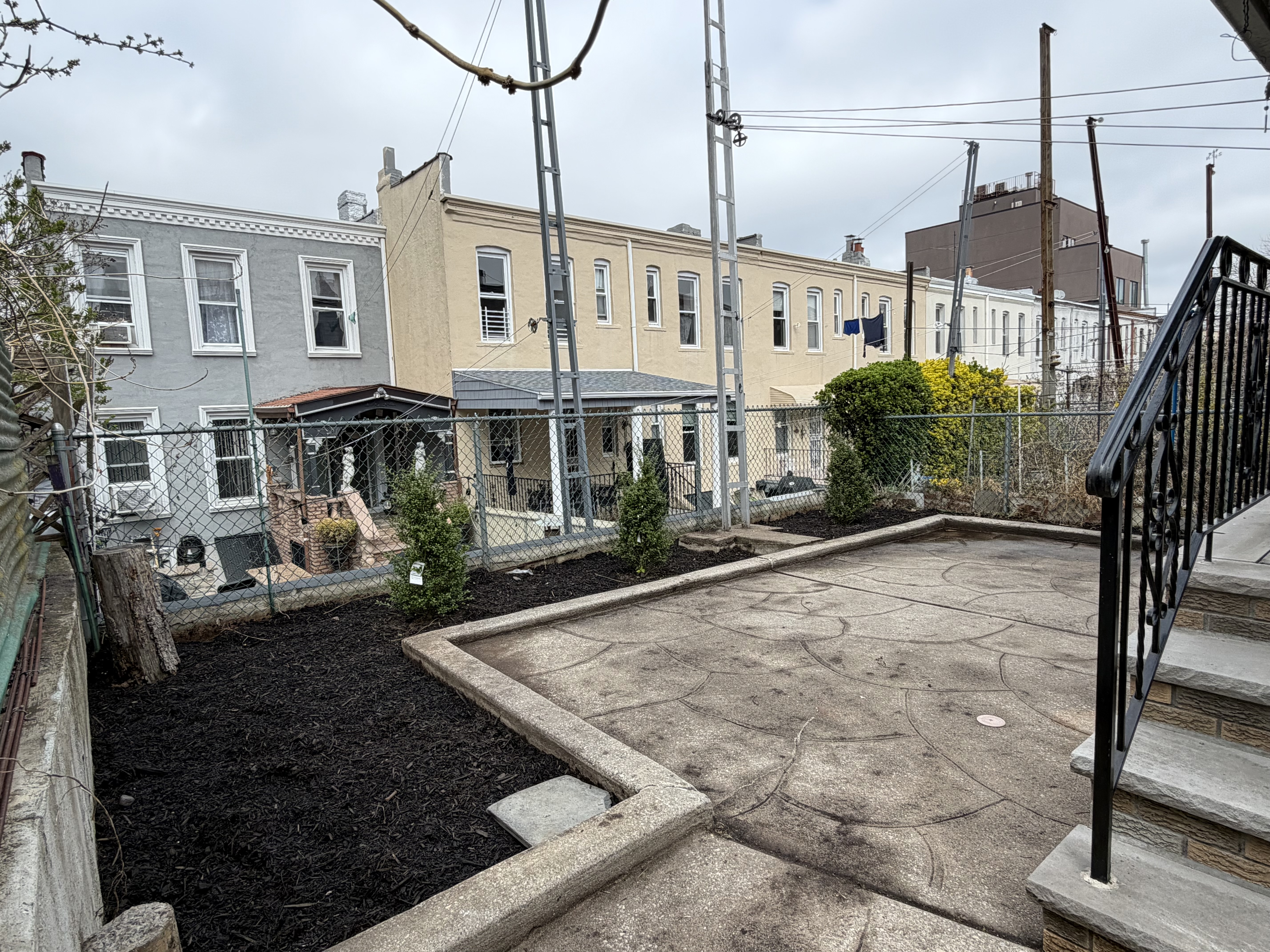 18-61 Dekalb Avenue, Unit 1 Queens, NY 11385 - Photo 10 of 12 a view of a house with backyard and sitting area
