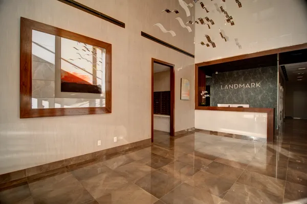 a view of an empty room with a fireplace