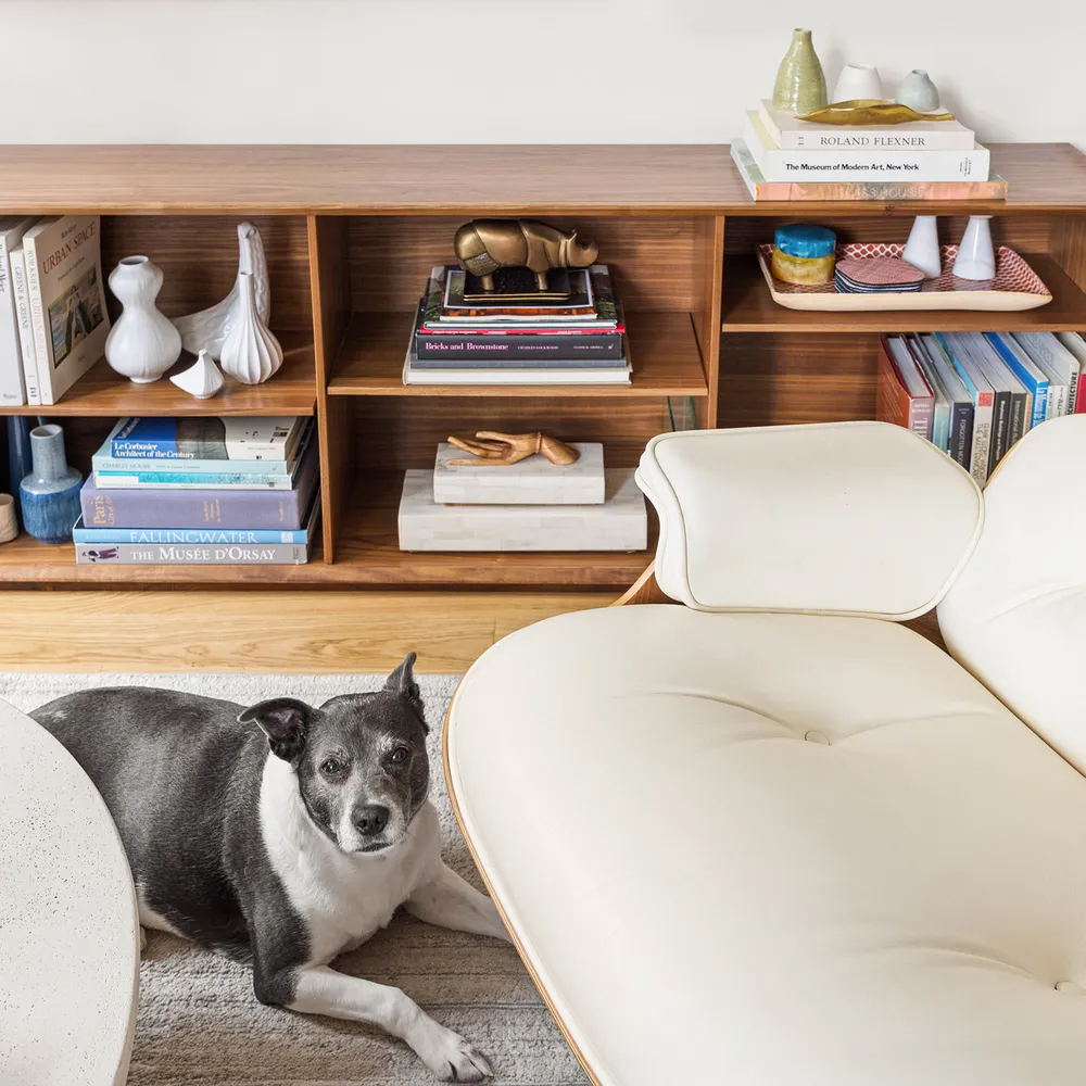 a living room with furniture and decor