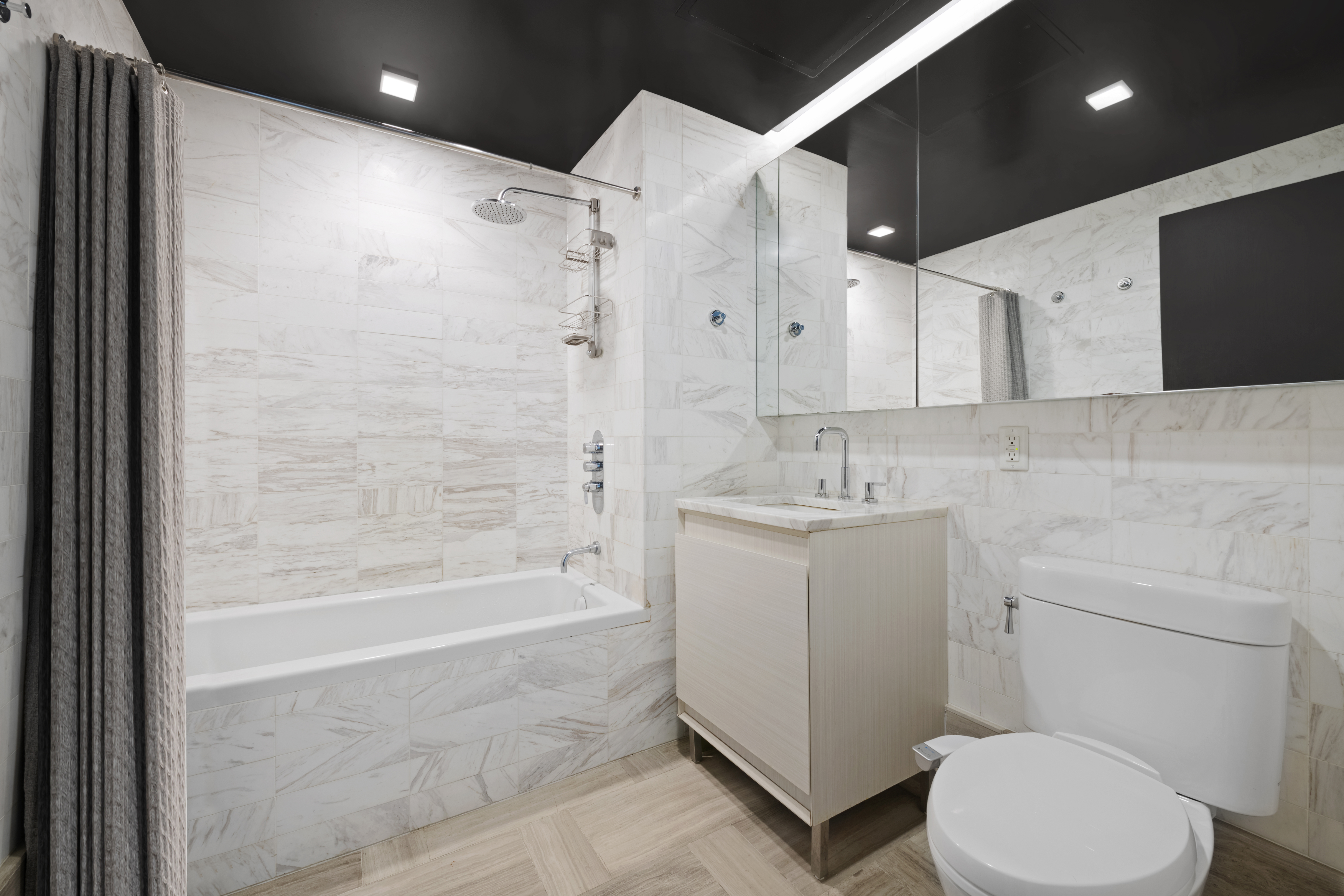 554 4th Avenue, Unit 3A Brooklyn, NY 11215 - Photo 6 of 11 a bathroom with a sink a toilet and shower