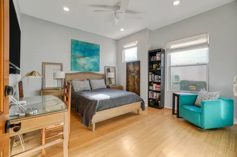 a very nice looking living room with furniture and a flat screen tv