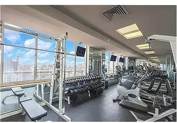 a view of a room with gym equipment