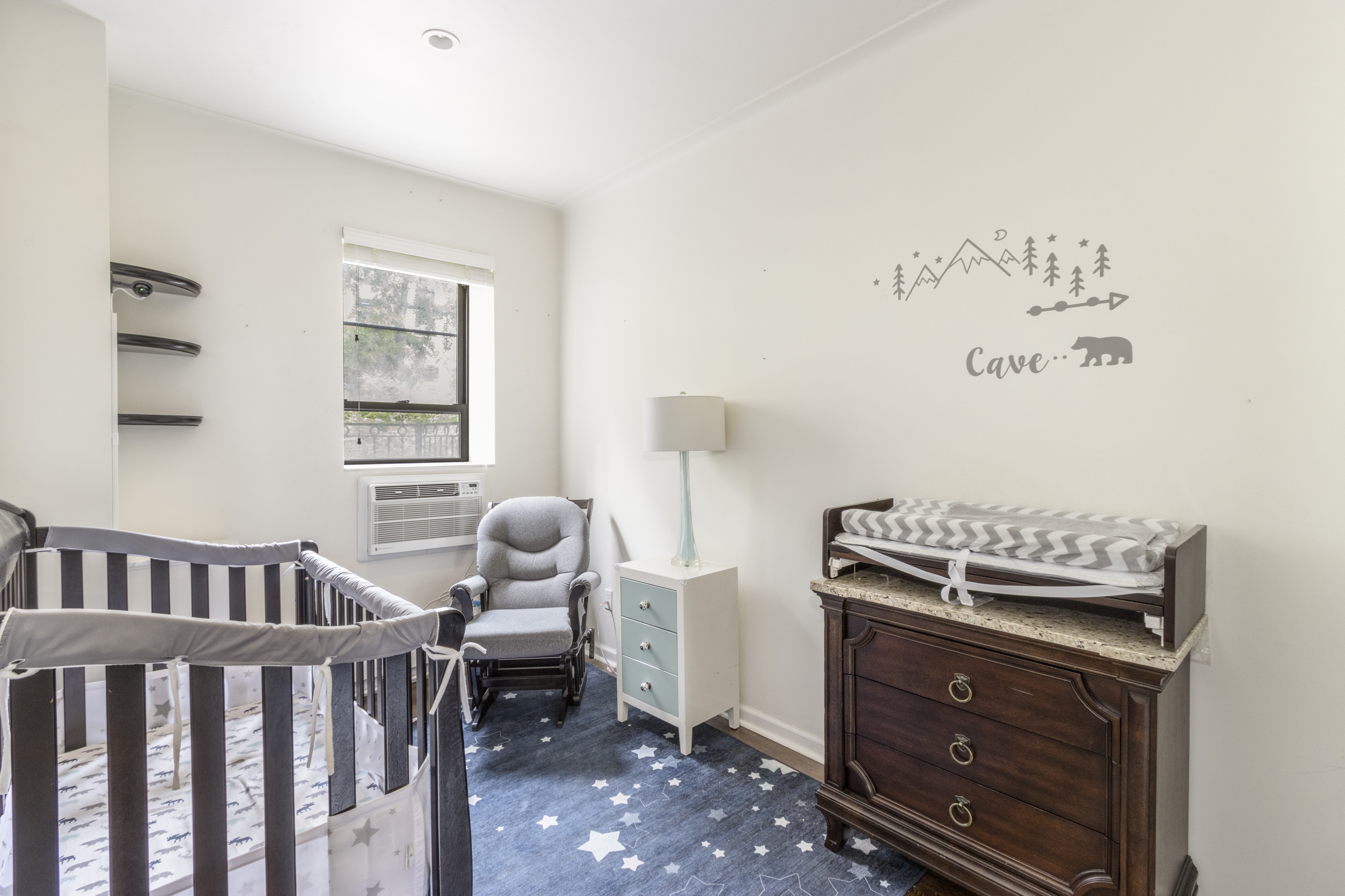 160 East 74th Street, Unit 3 Manhattan, NY 10021 - Photo 7 of 12 a bedroom with furniture and a window