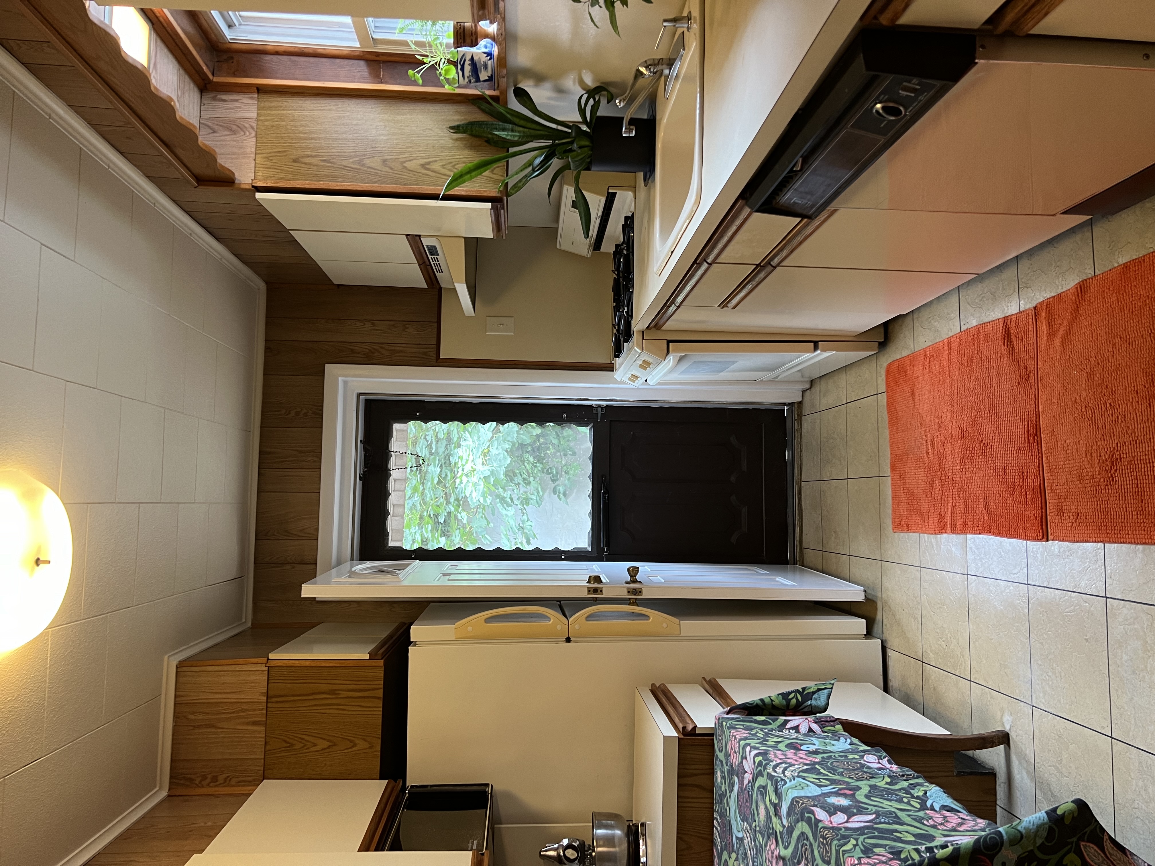 181 Terrace Place Brooklyn, NY 11218 - Photo 9 of 22 a kitchen with a sink stove and refrigerator